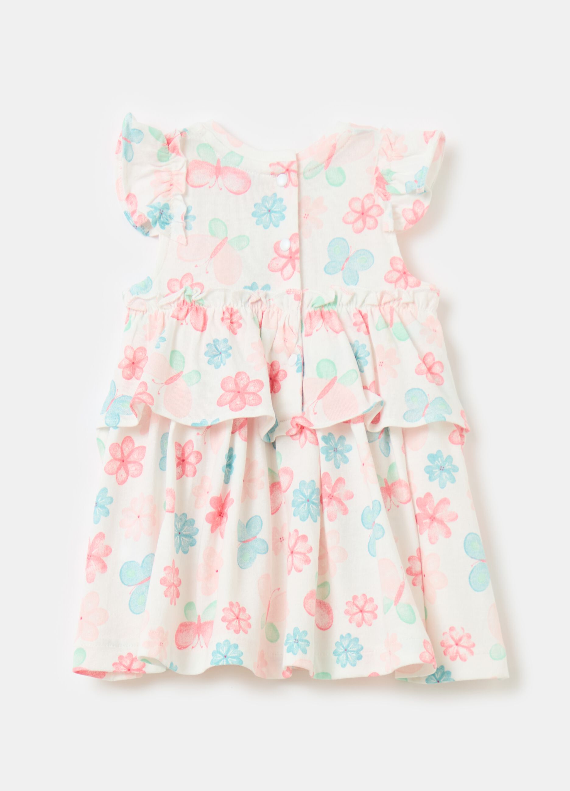 Floral dress in organic cotton with flounce