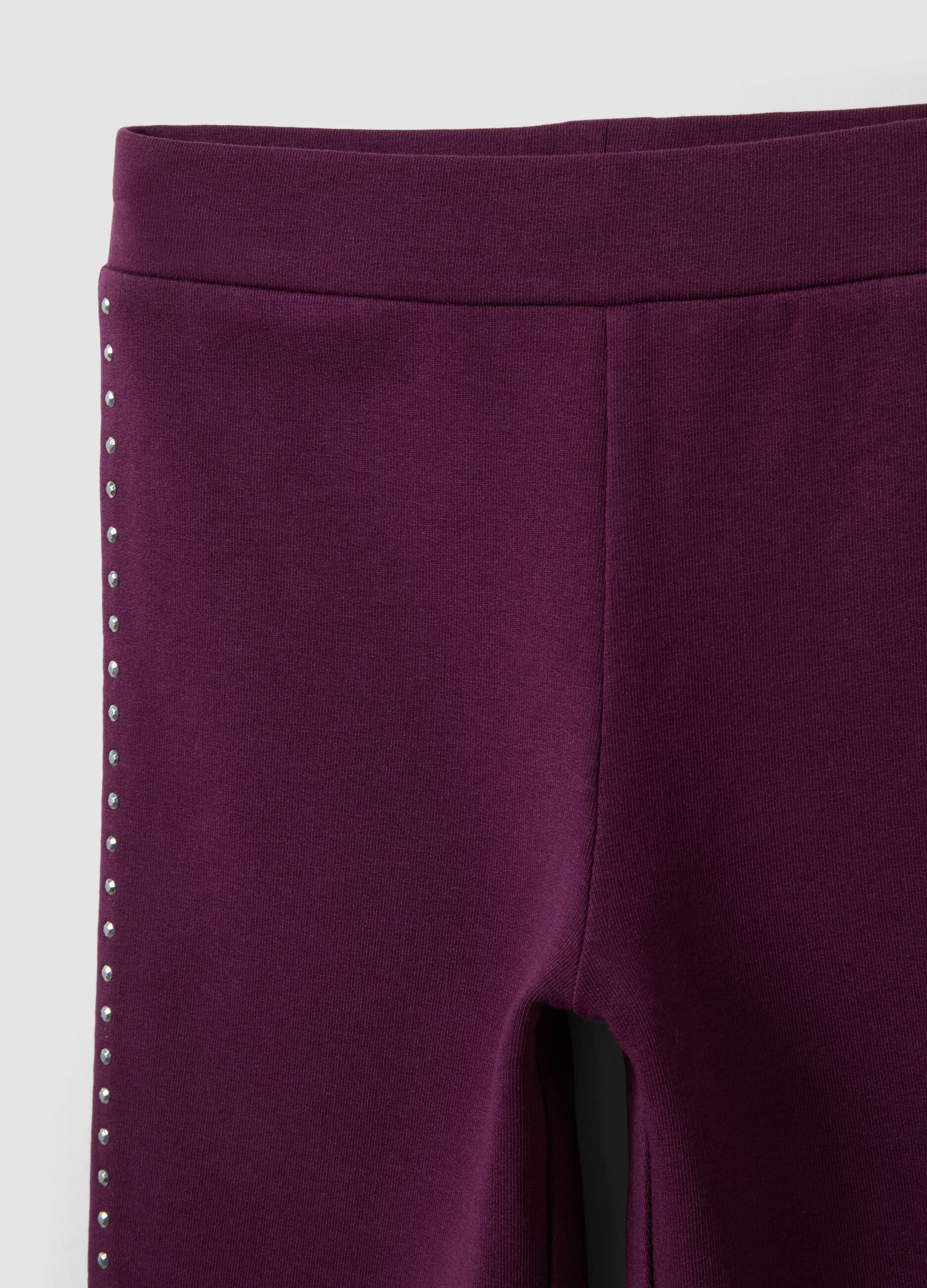 Leggings viola flare in cotone elasticizzato con borchie