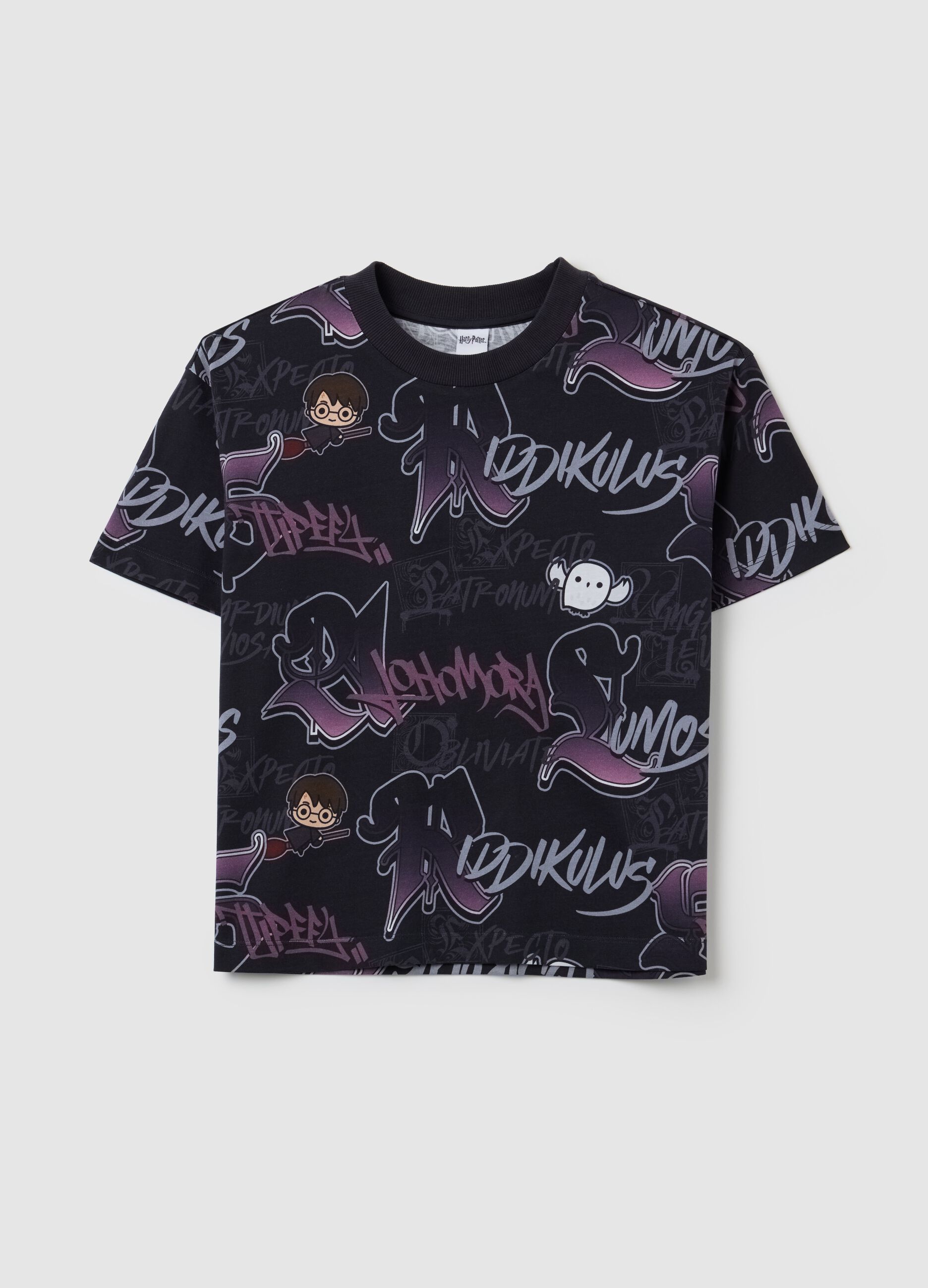 Girls’ oversized black T-shirt in 100% cotton with bold pattern
