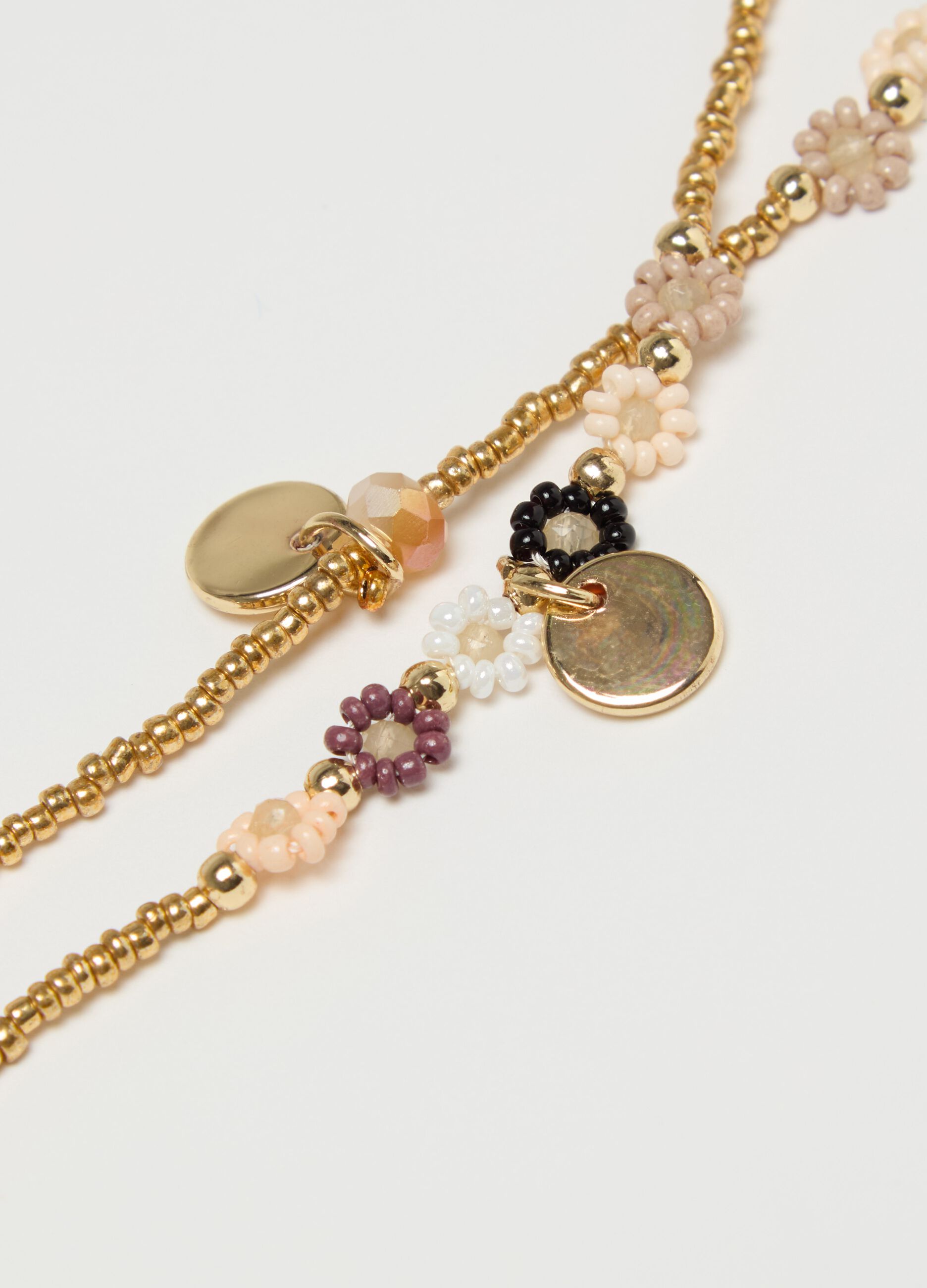 Collana girocollo con perline e fiorellini
