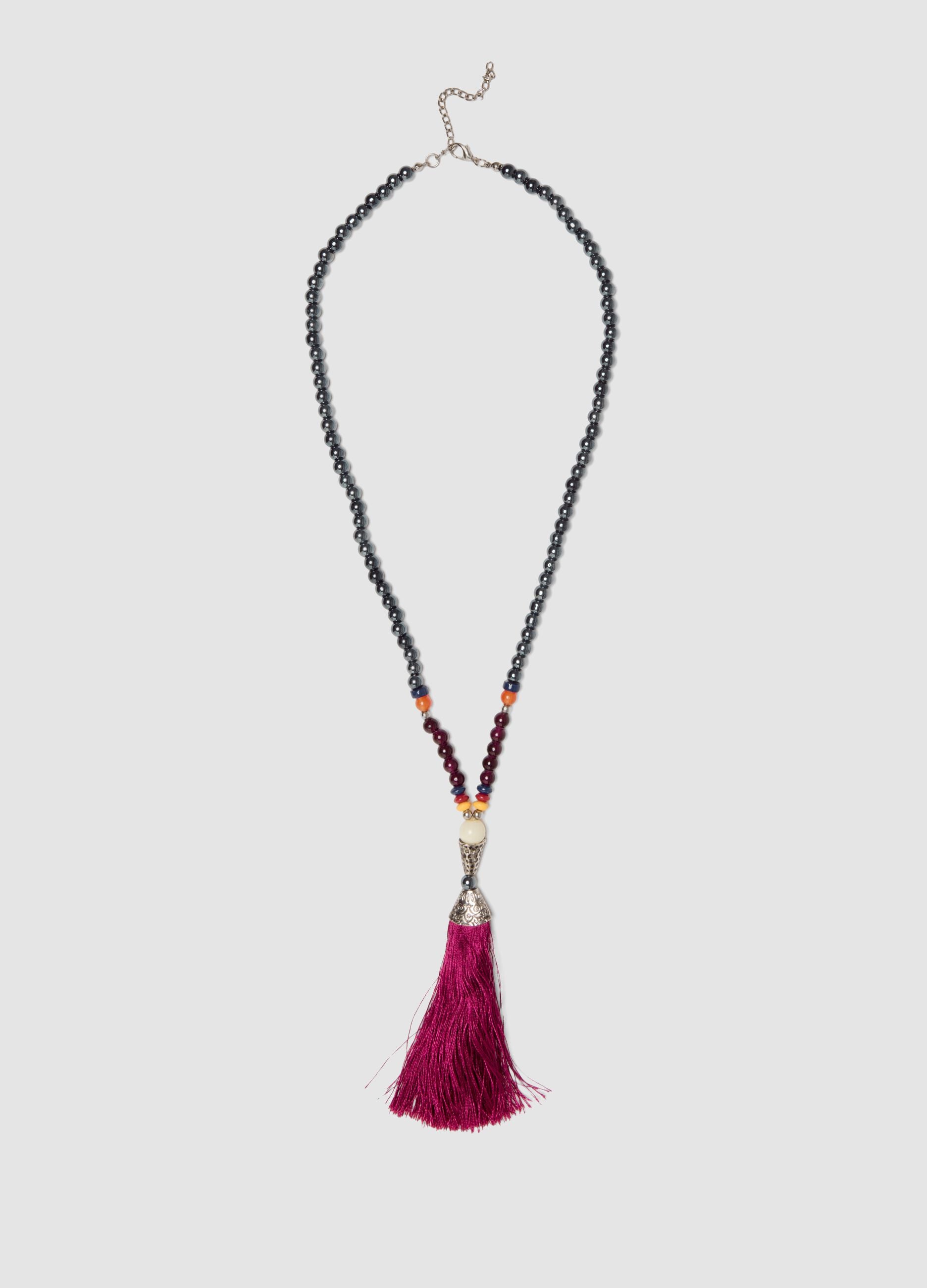 Red necklace with decorative tassel