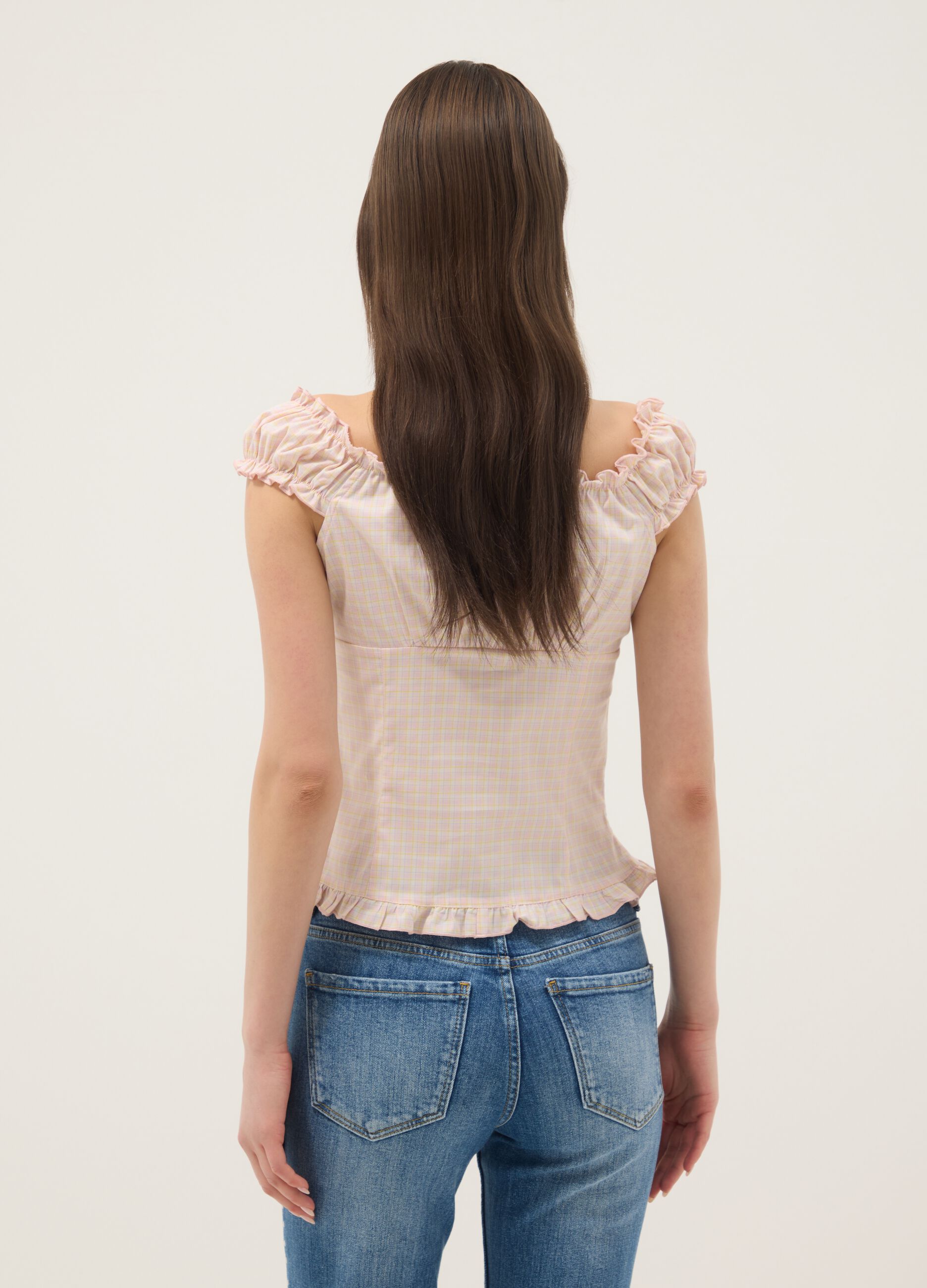 Pink organic cotton blouse with buttons and ruffles