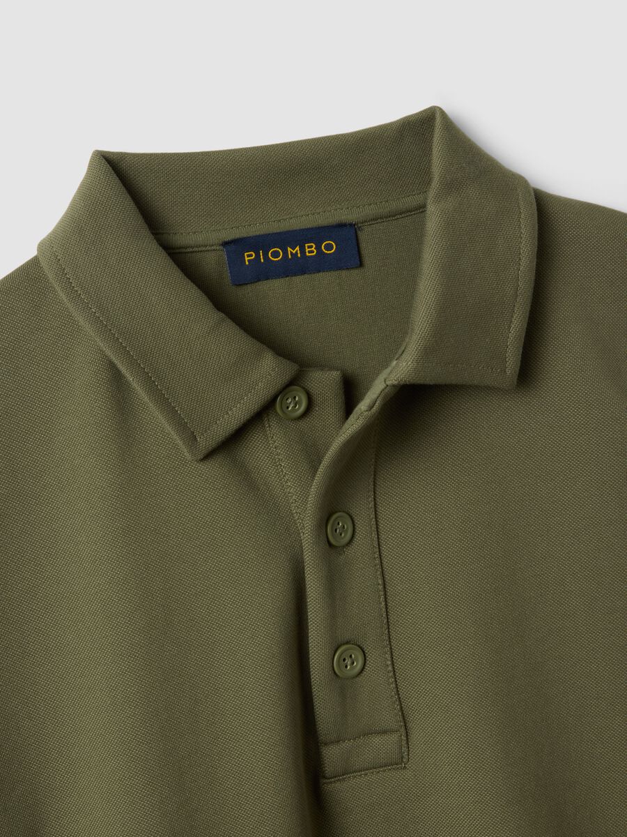 Felpa verde in tessuto elasticizzato con collo polo relaxed fit_1