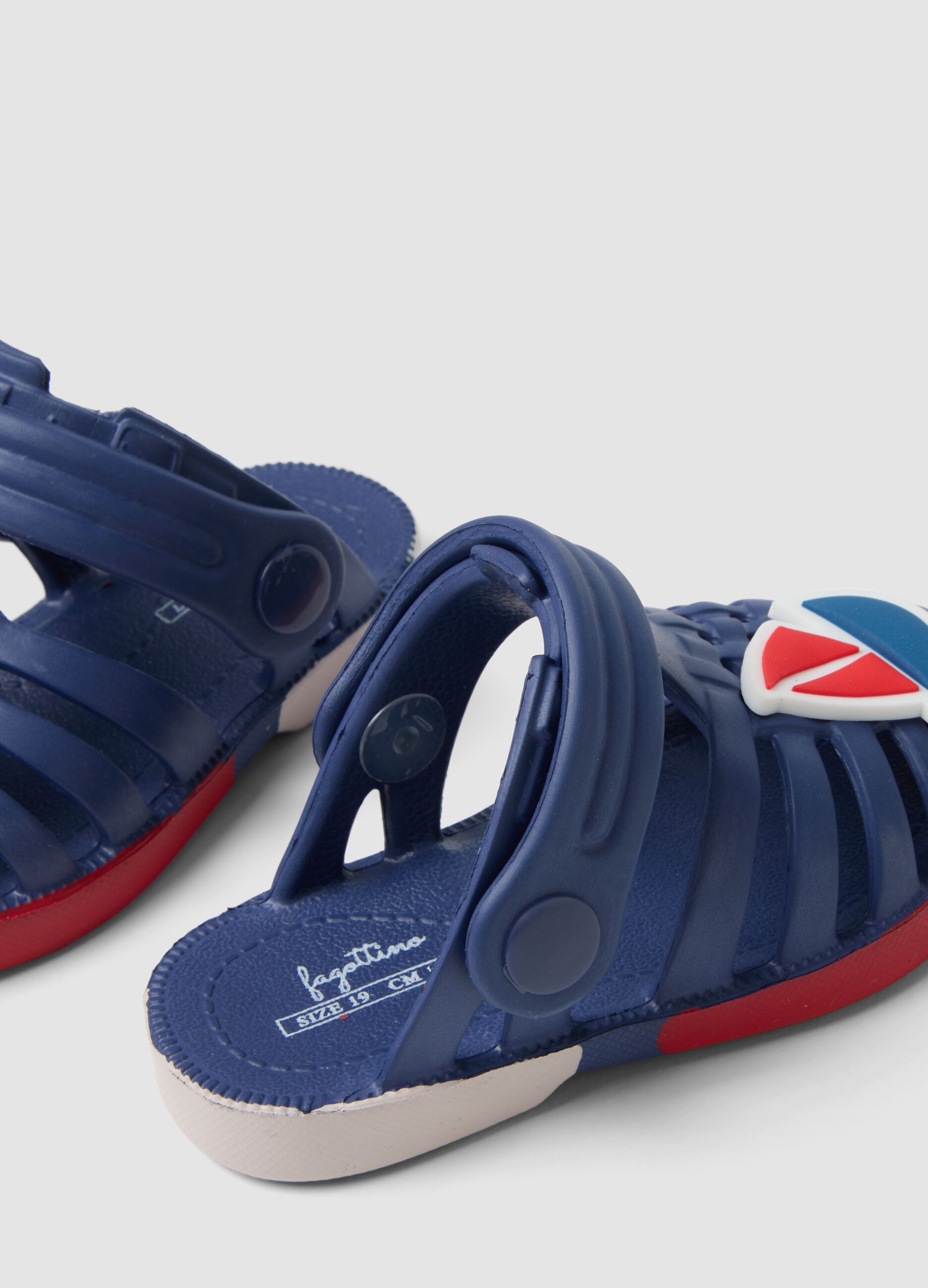 Blue beach sandals with little boat motif