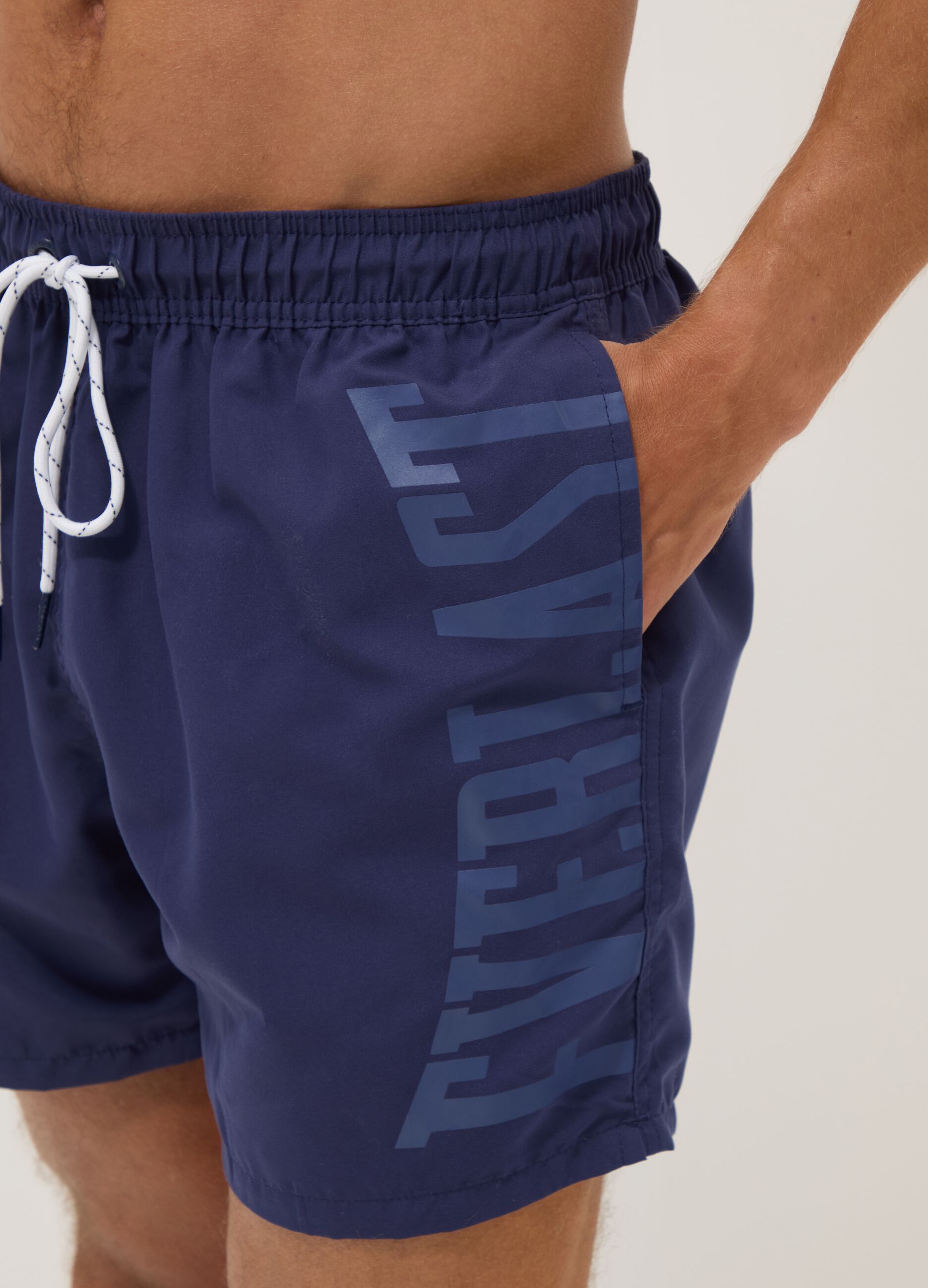 Blue swim shorts with contrast drawstring