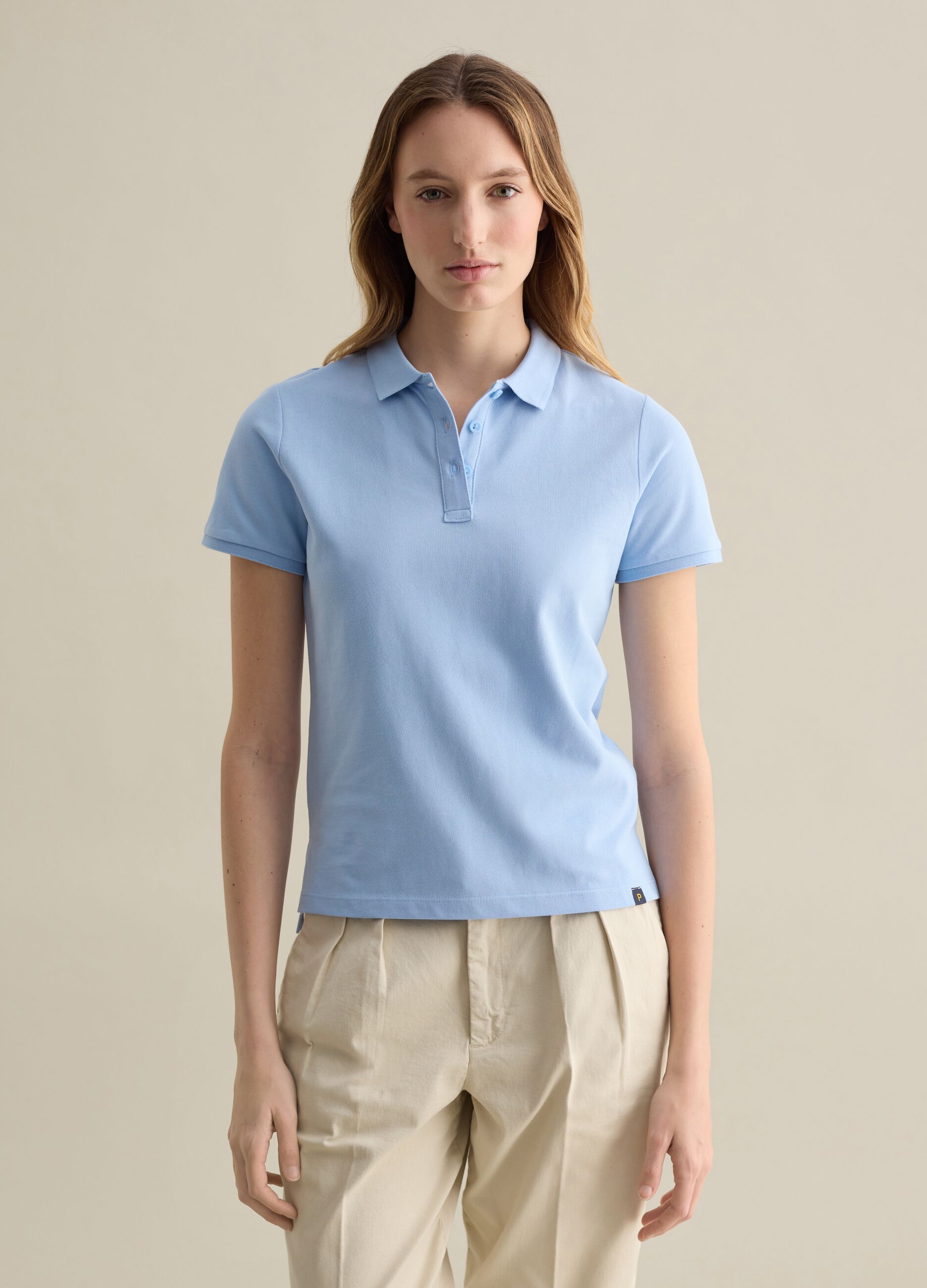 Light blue short-sleeved polo shirt in piquet