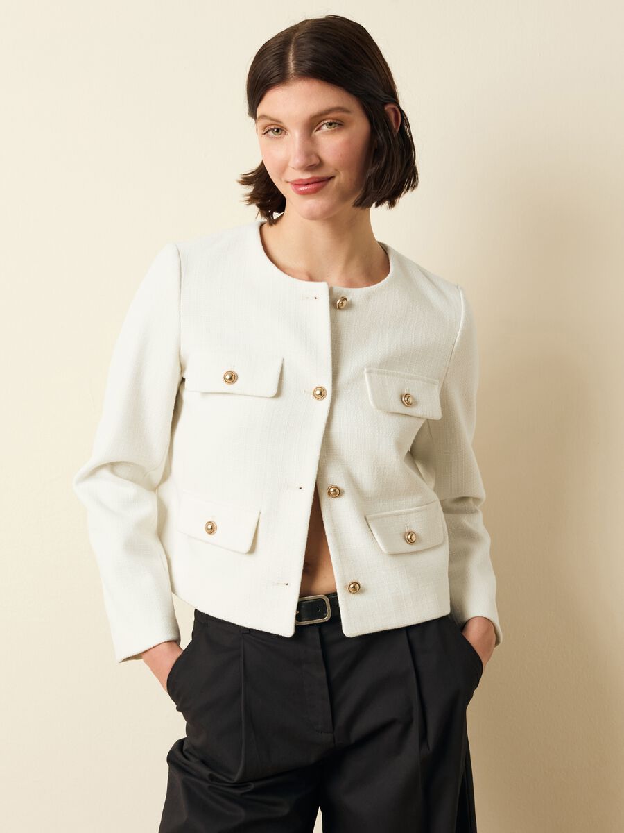 Short jacket with golden buttons_0
