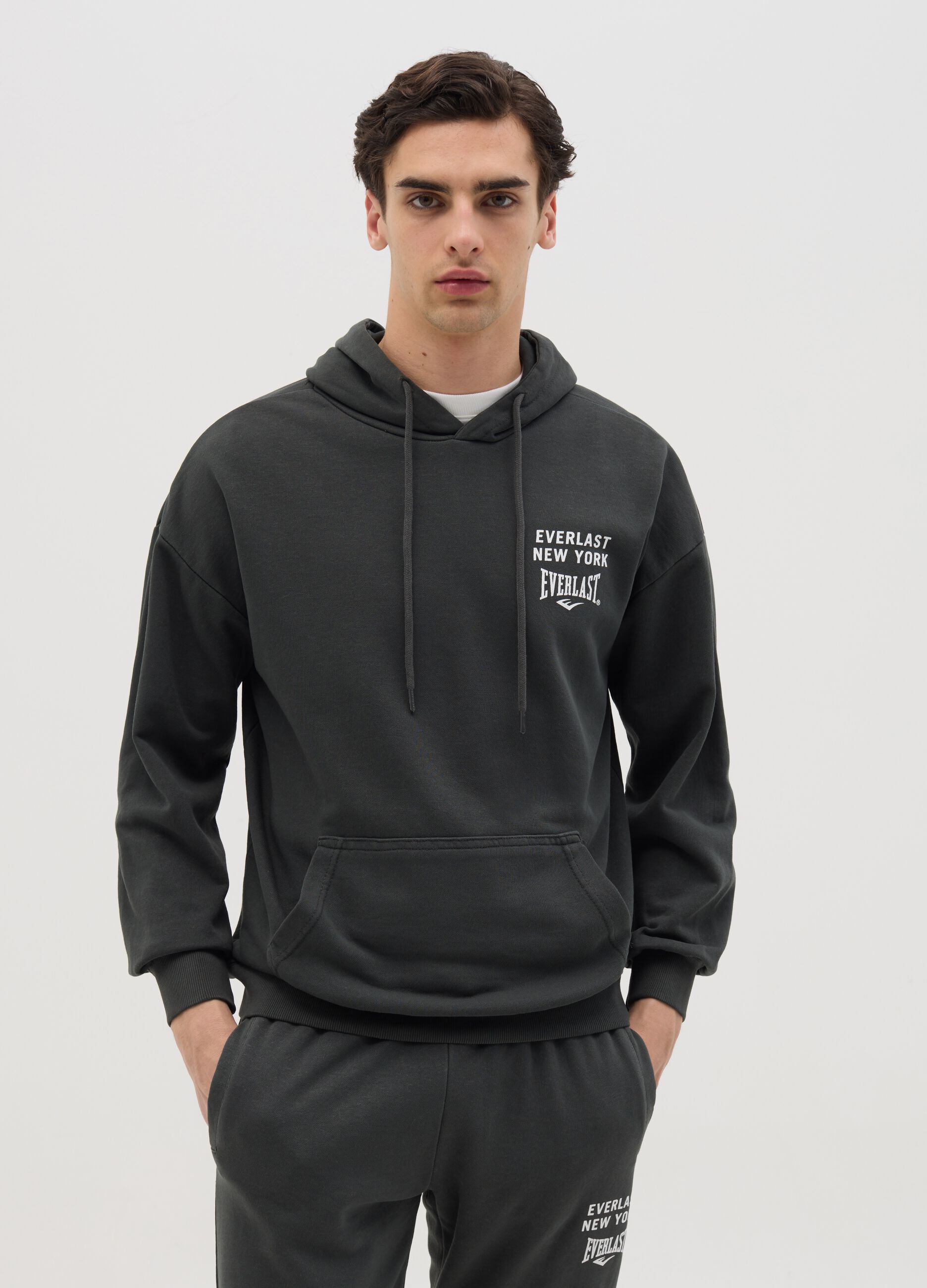 Grey sweatshirt with hood and logo print
