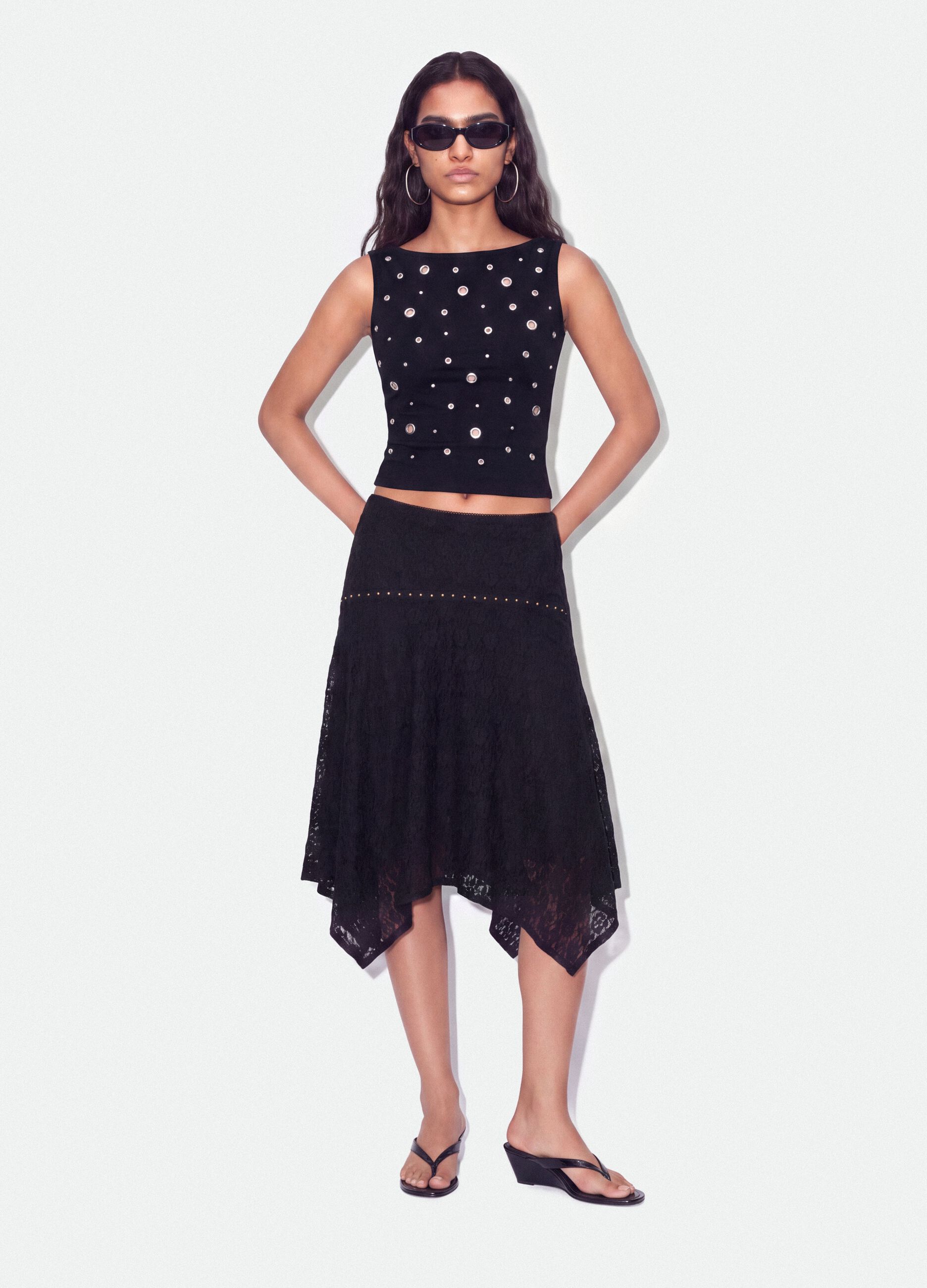 Black stretch cotton top with metal eyelets, regular fit