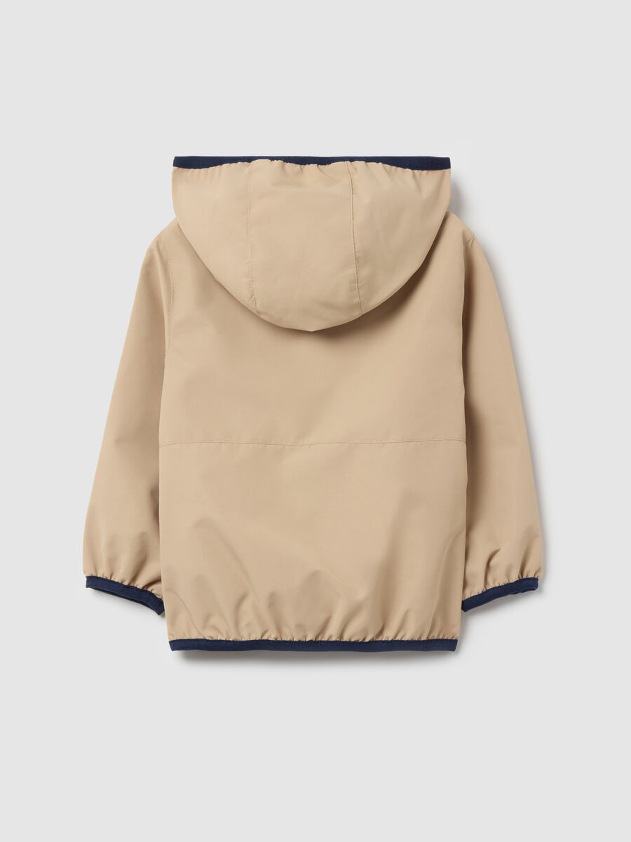 Jacket with hood and contrasting edging_1
