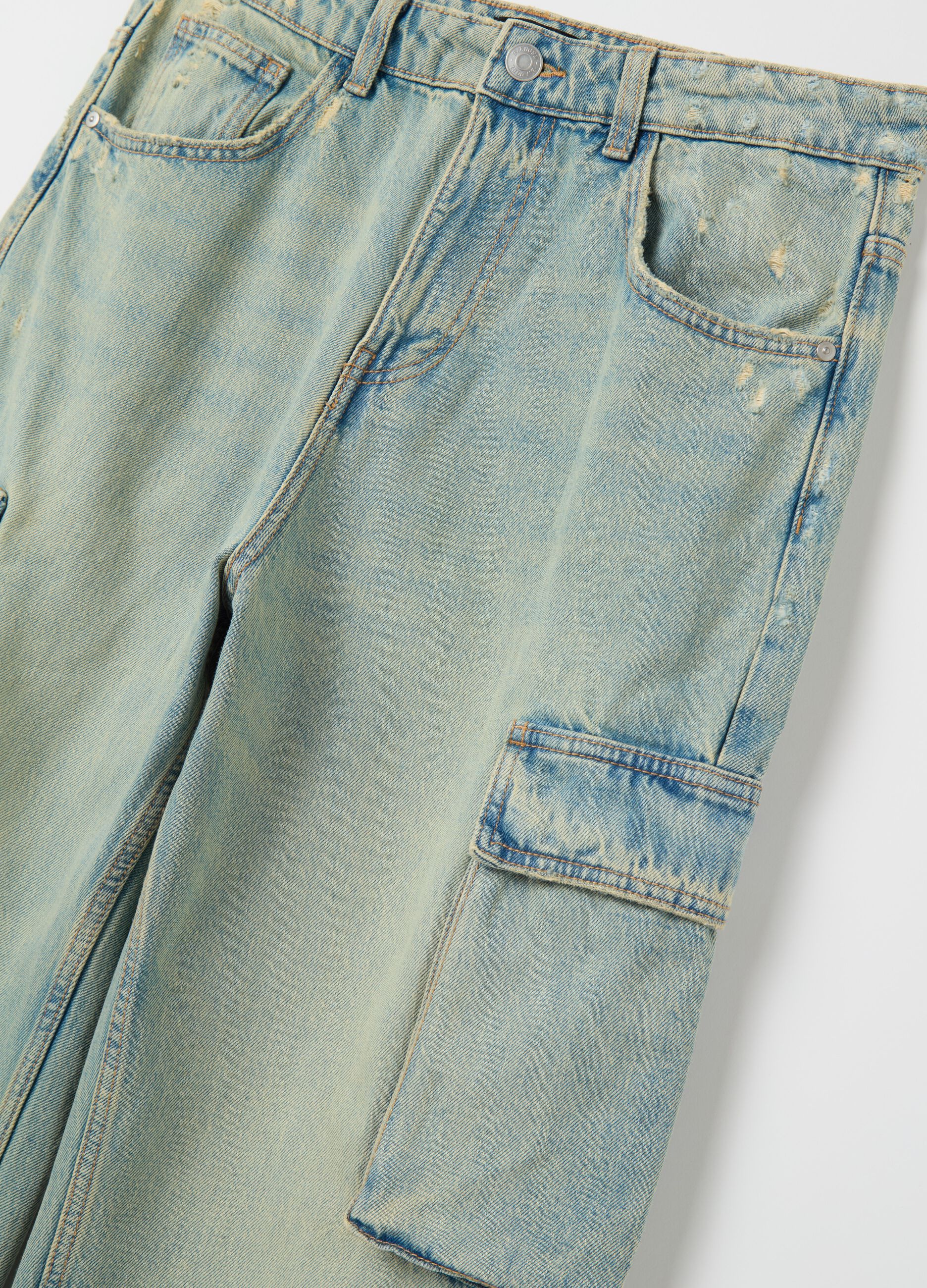 Jeans cargo acid wash con scoloriture