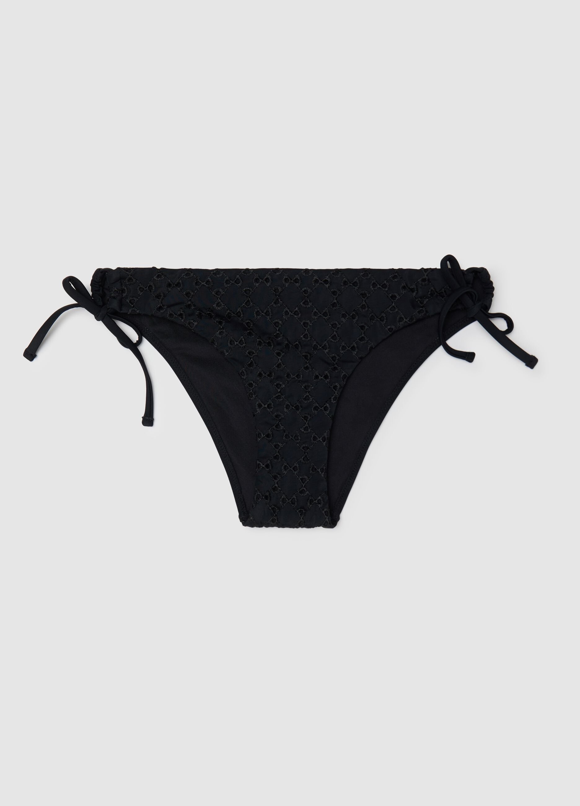 Women’s bikini briefs in black stretch fabric with floral embroidery