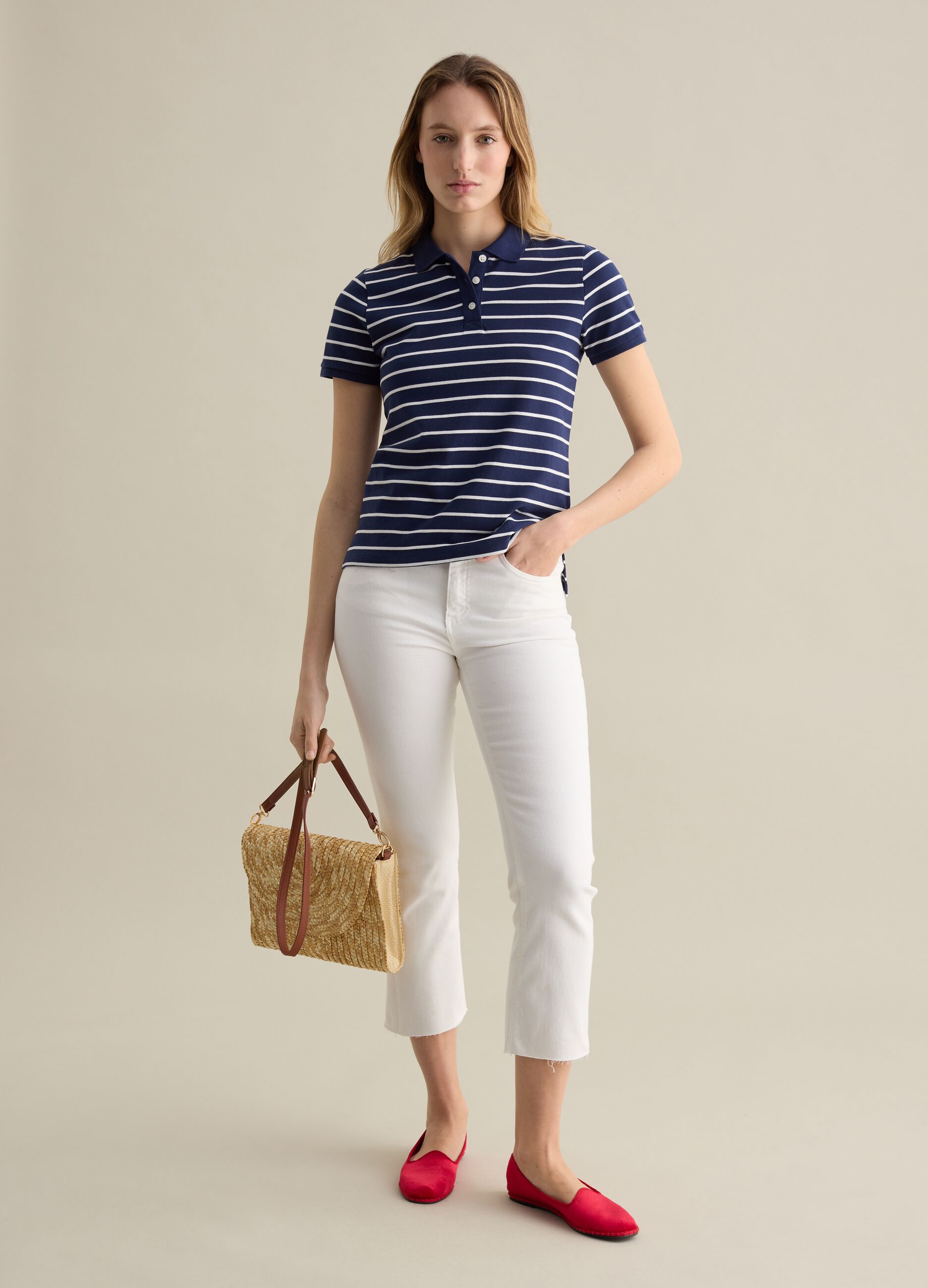 Blue and white striped polo shirt in piquet