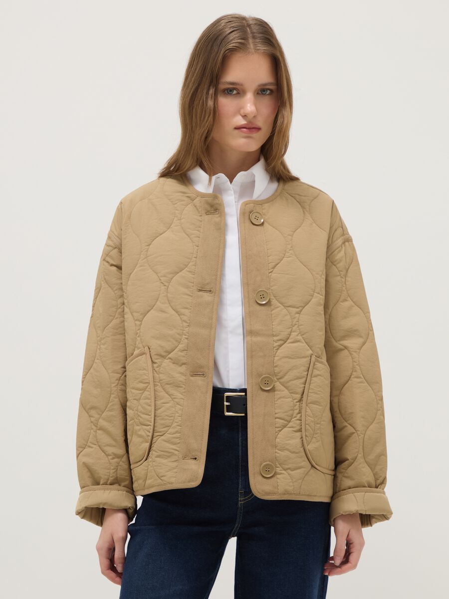 Beige padded regular fit jacket with buttons_0