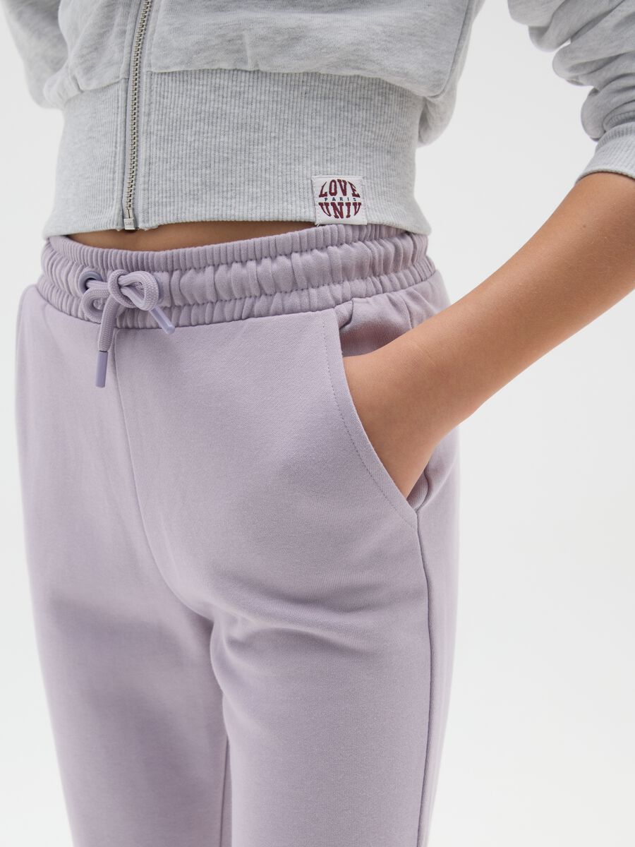 Girl's purple flare trousers in pure cotton with regular waist_2