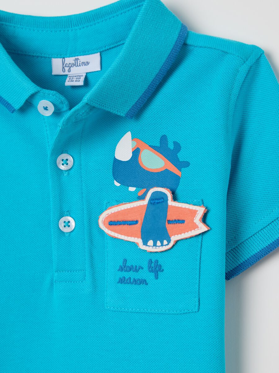Light blue polo shirt in piquet with hippopotamus surfer_3