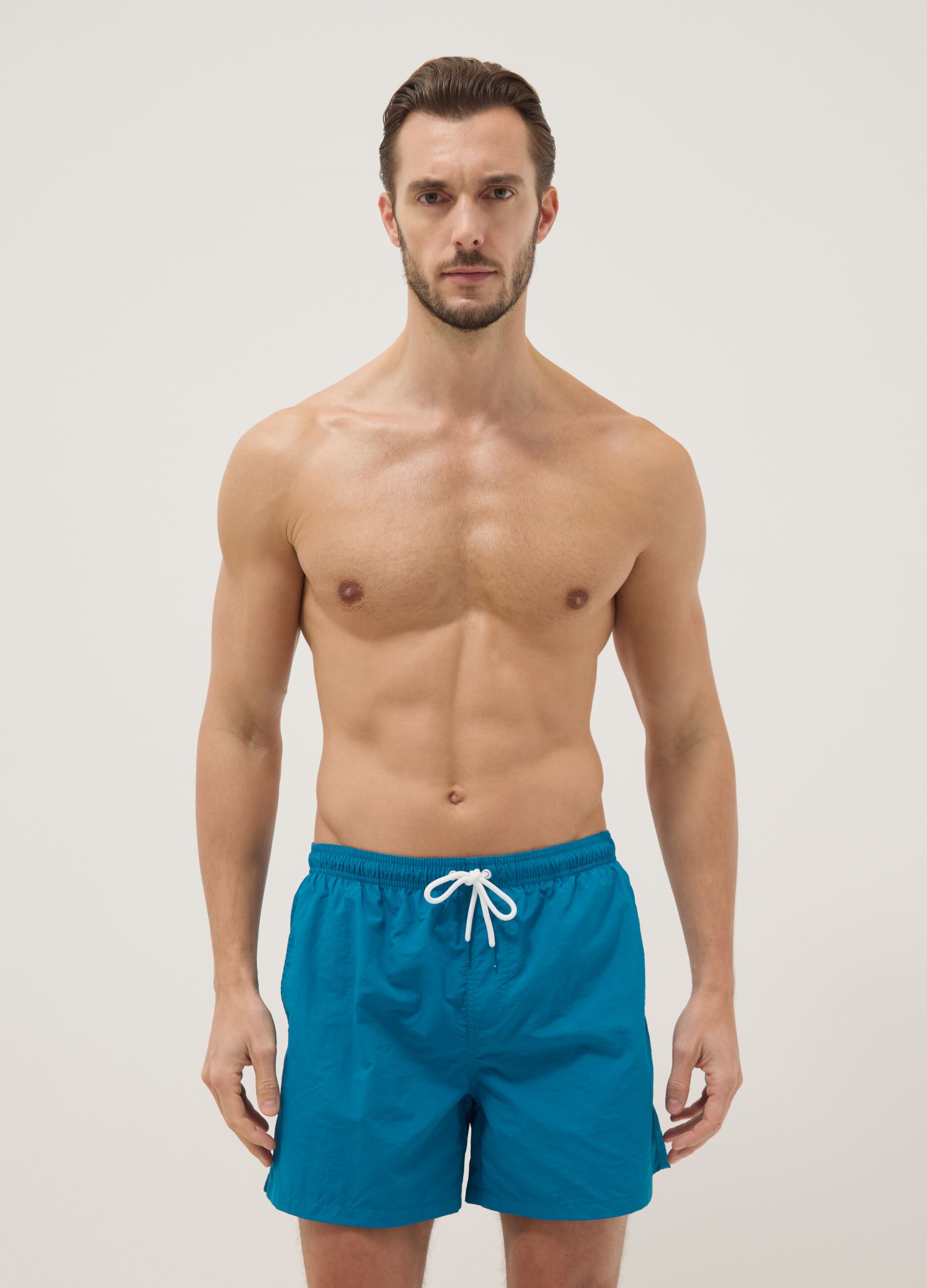 Boxer da mare azzurro con elastico in vita
