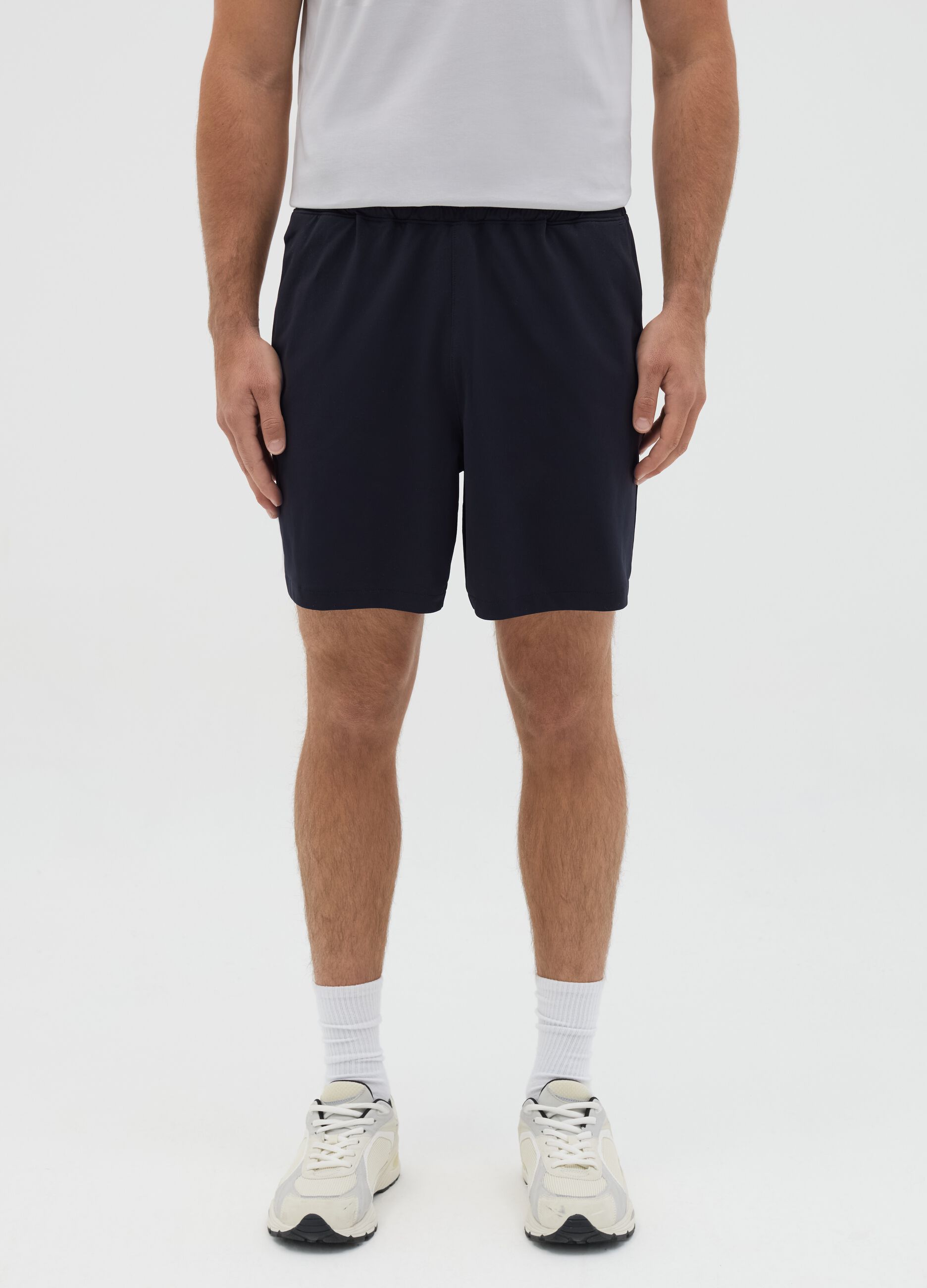 Blue Bermuda joggers in stretch fabric