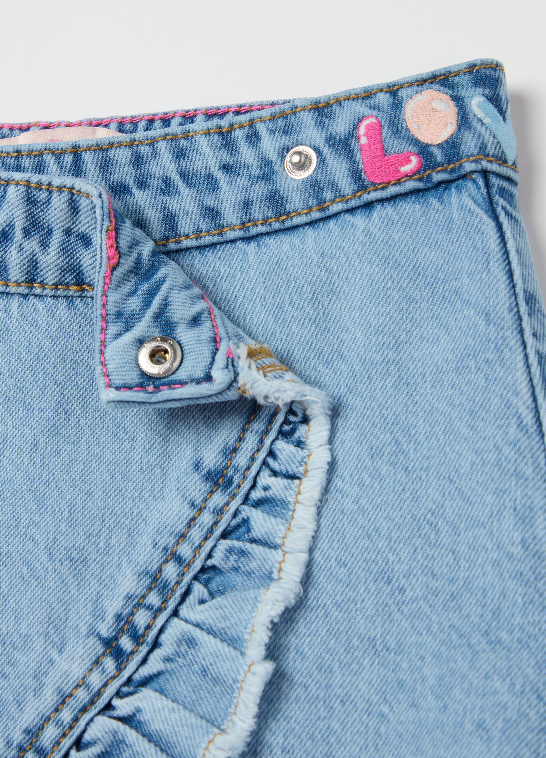 Denim skirt with frills and heart embroidery