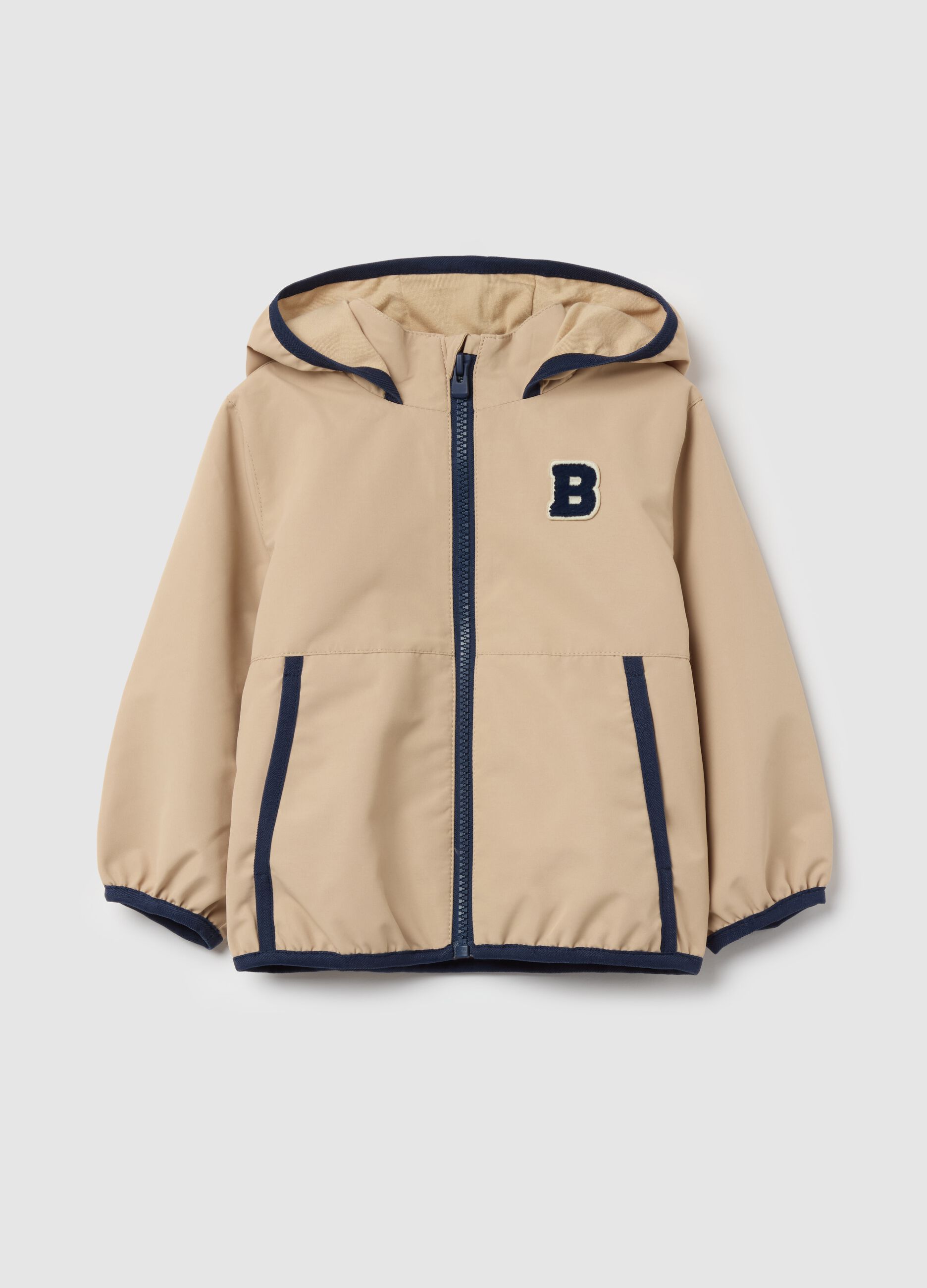 Jacket with hood and contrasting edging