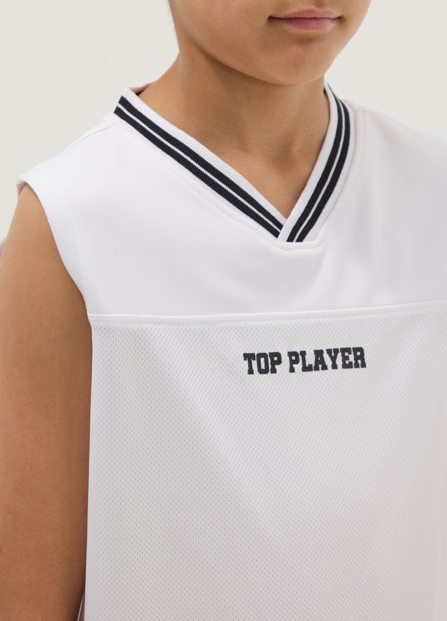 White sports vest with print
