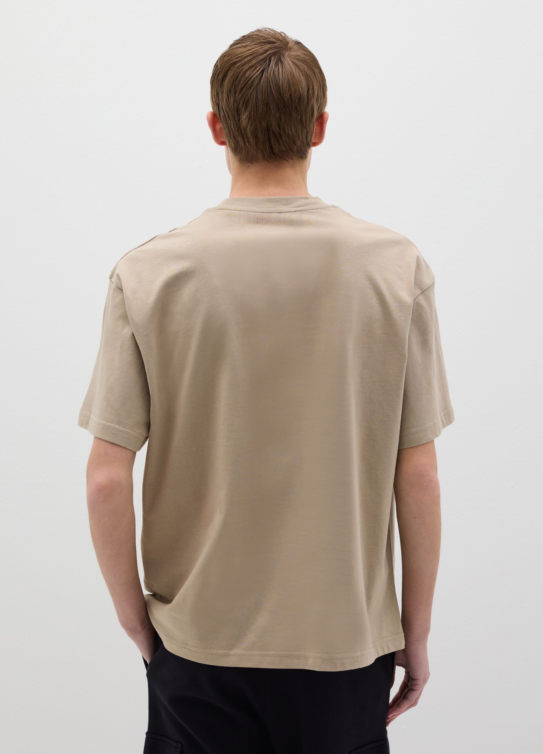 T-shirt in cotone con tasca