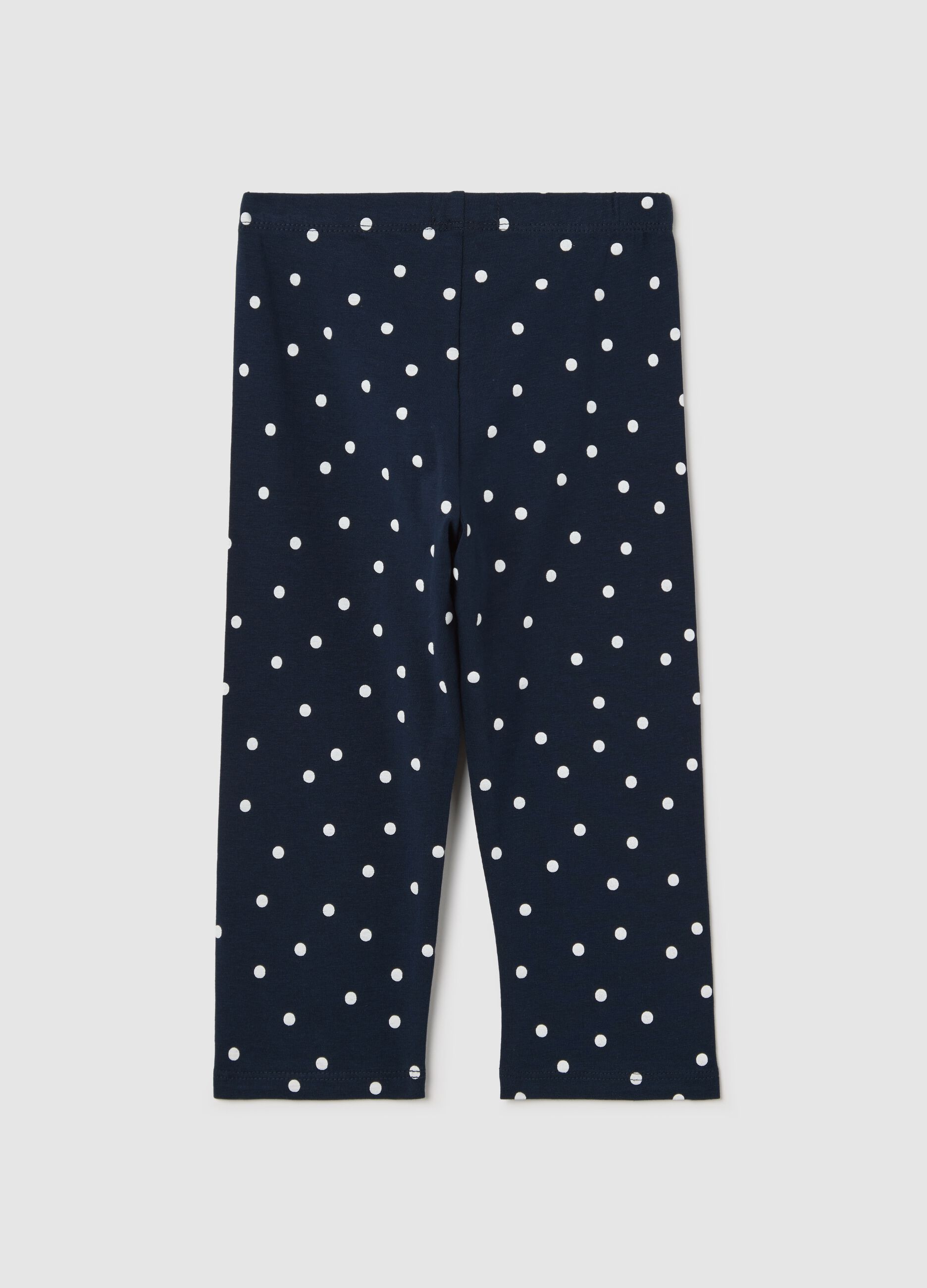 Blue three-quarter leggings with polka dot pattern
