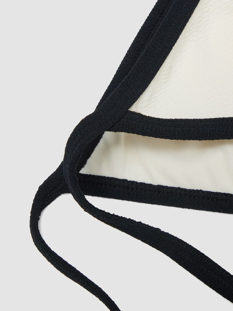 Slip bikini bianco e nero in tessuto elasticizzato con laccetti_5