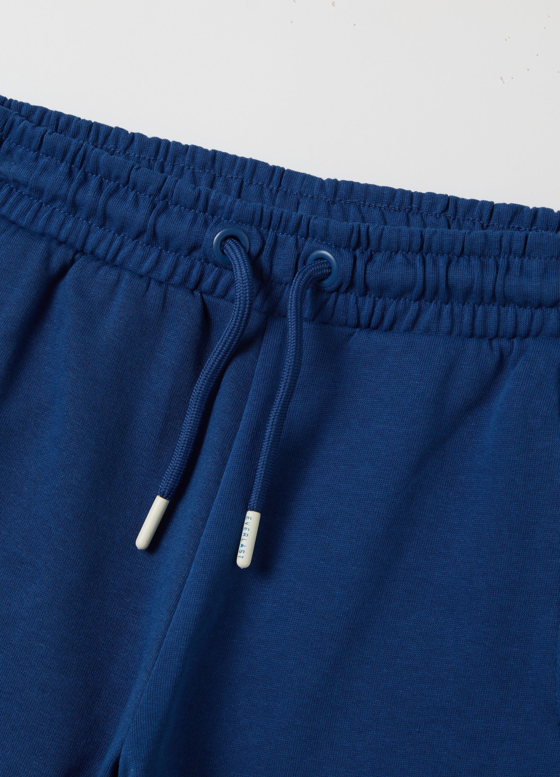 Blue Bermuda joggers with logo print and drawstring
