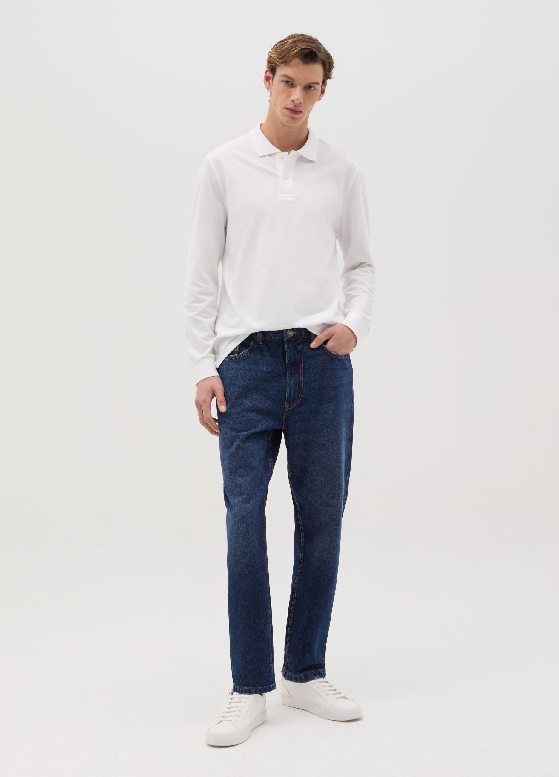 Jeans regular tapered fit con scoloriture