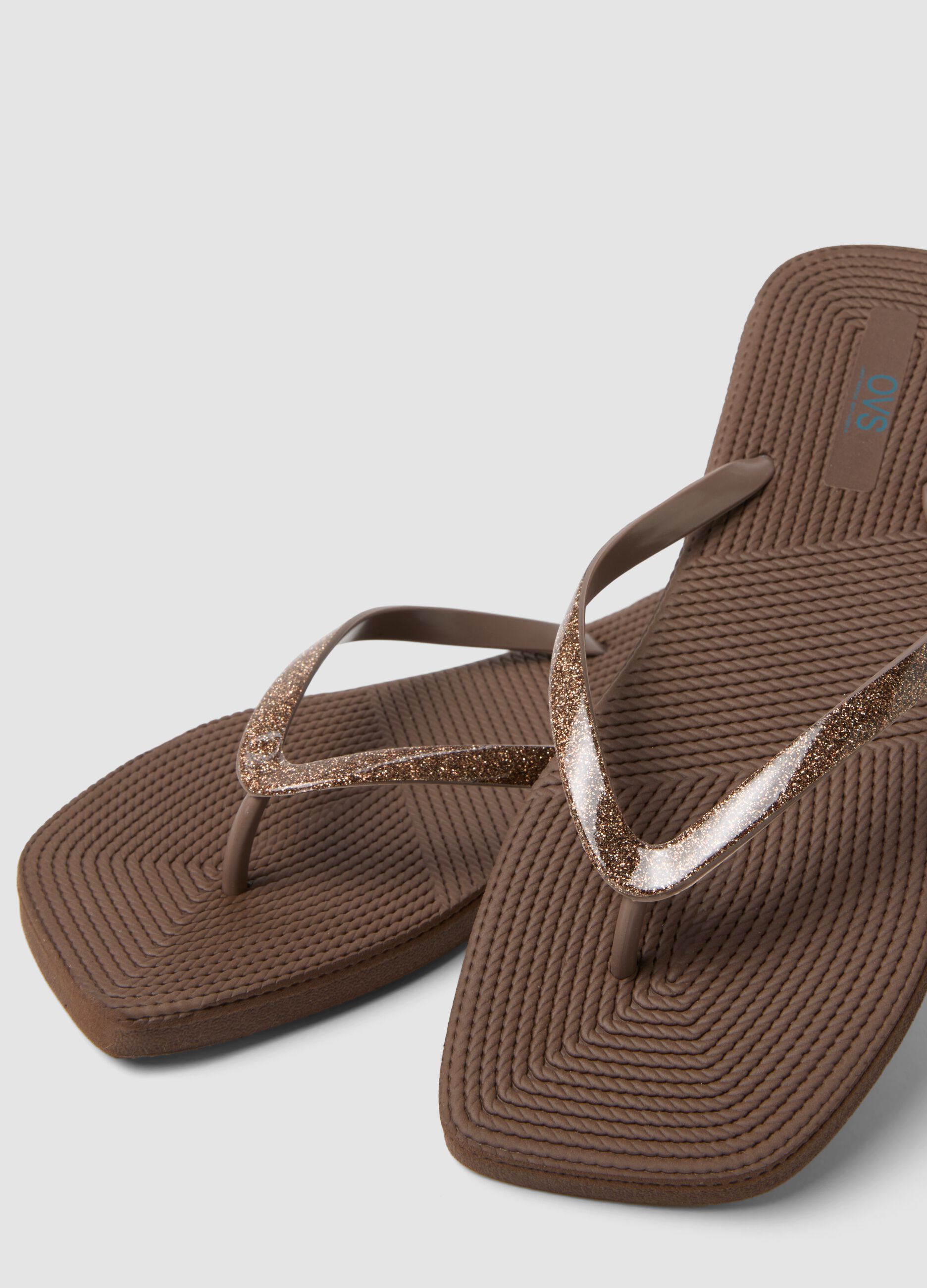 Brown flip-flops with glitter straps