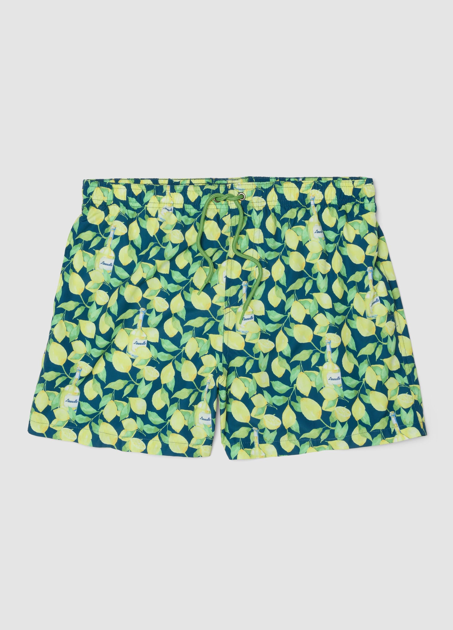 Blue boxer swim shorts with Limoncello print
