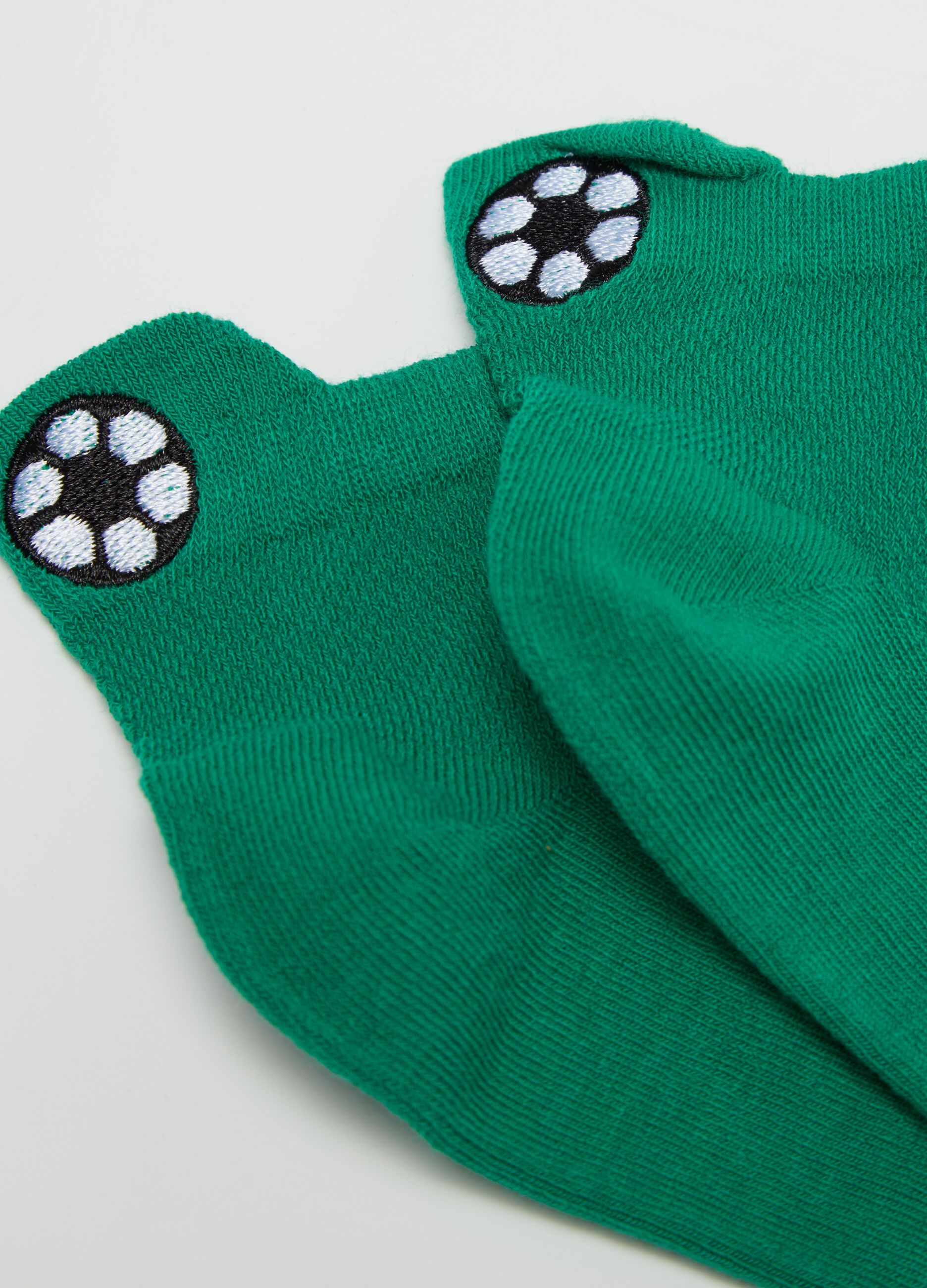 Three-pair pack shoe liners with sports motif embroidery
