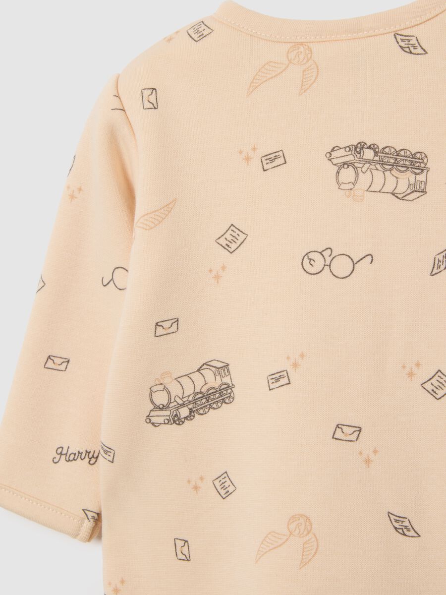 Beige baby girl jumpsuit with Harry Potter print_3