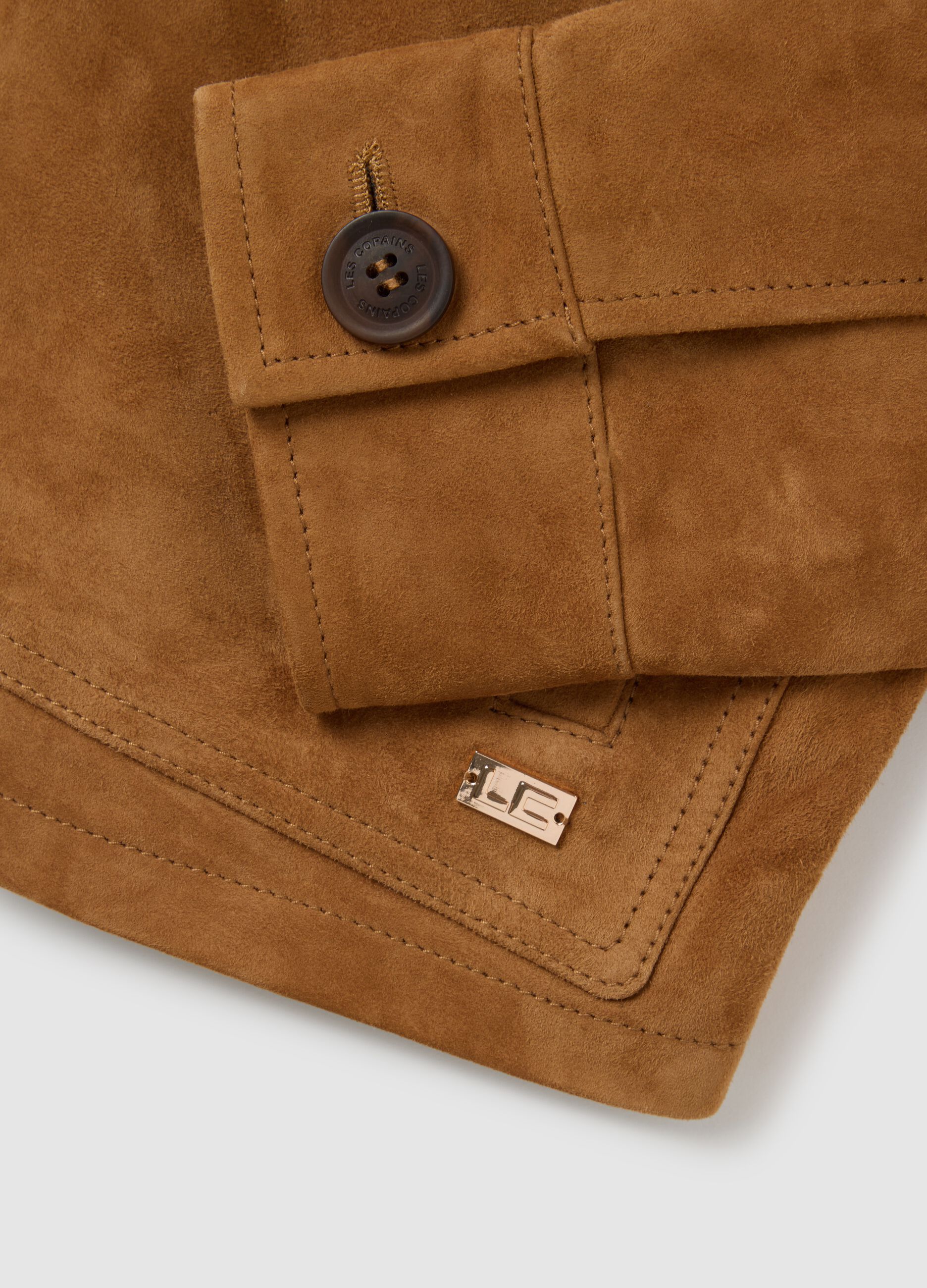Giacca in vera pelle con bottoni e tasche ampie