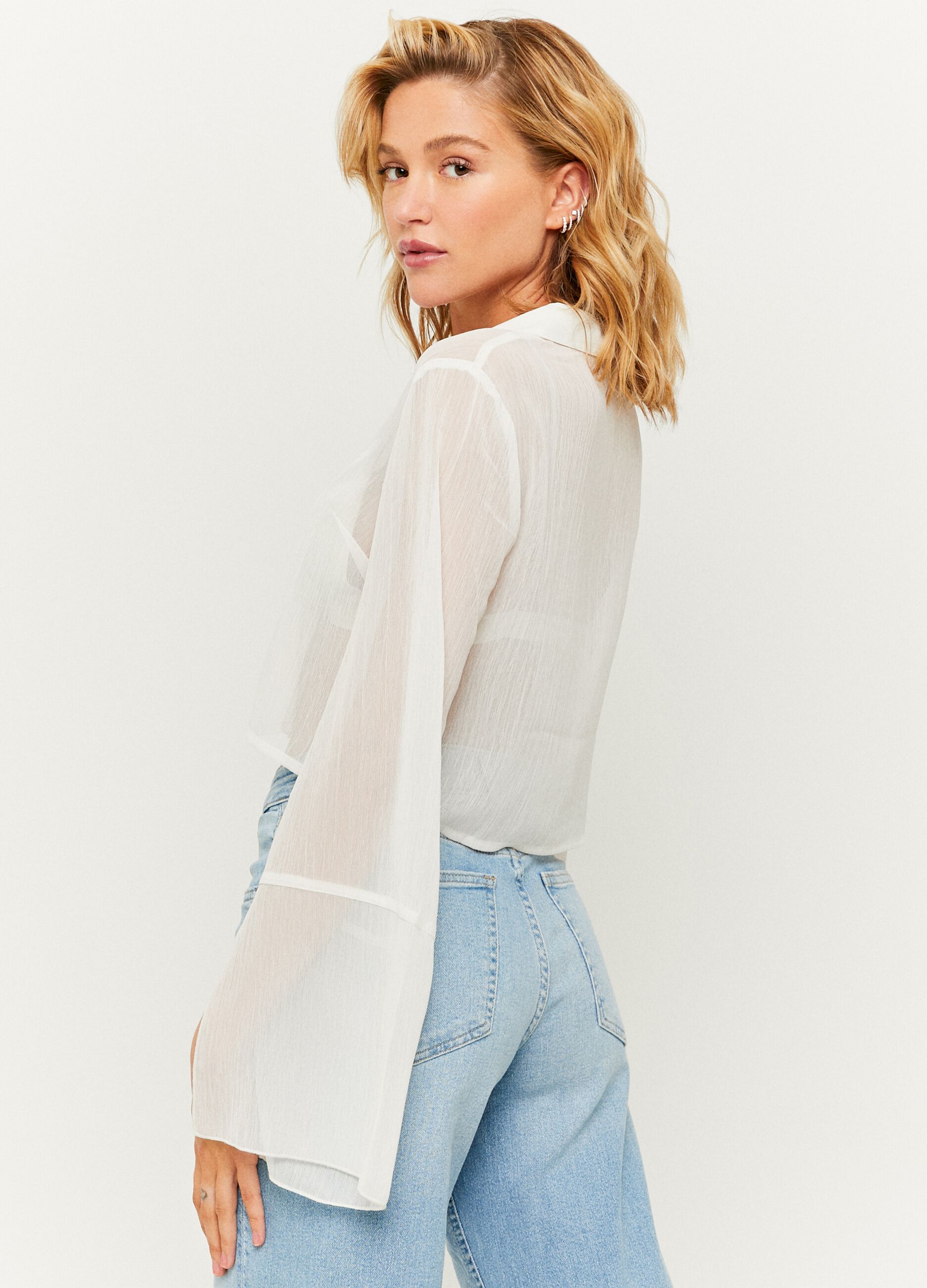 Semi-sheer blouse with flared sleeves