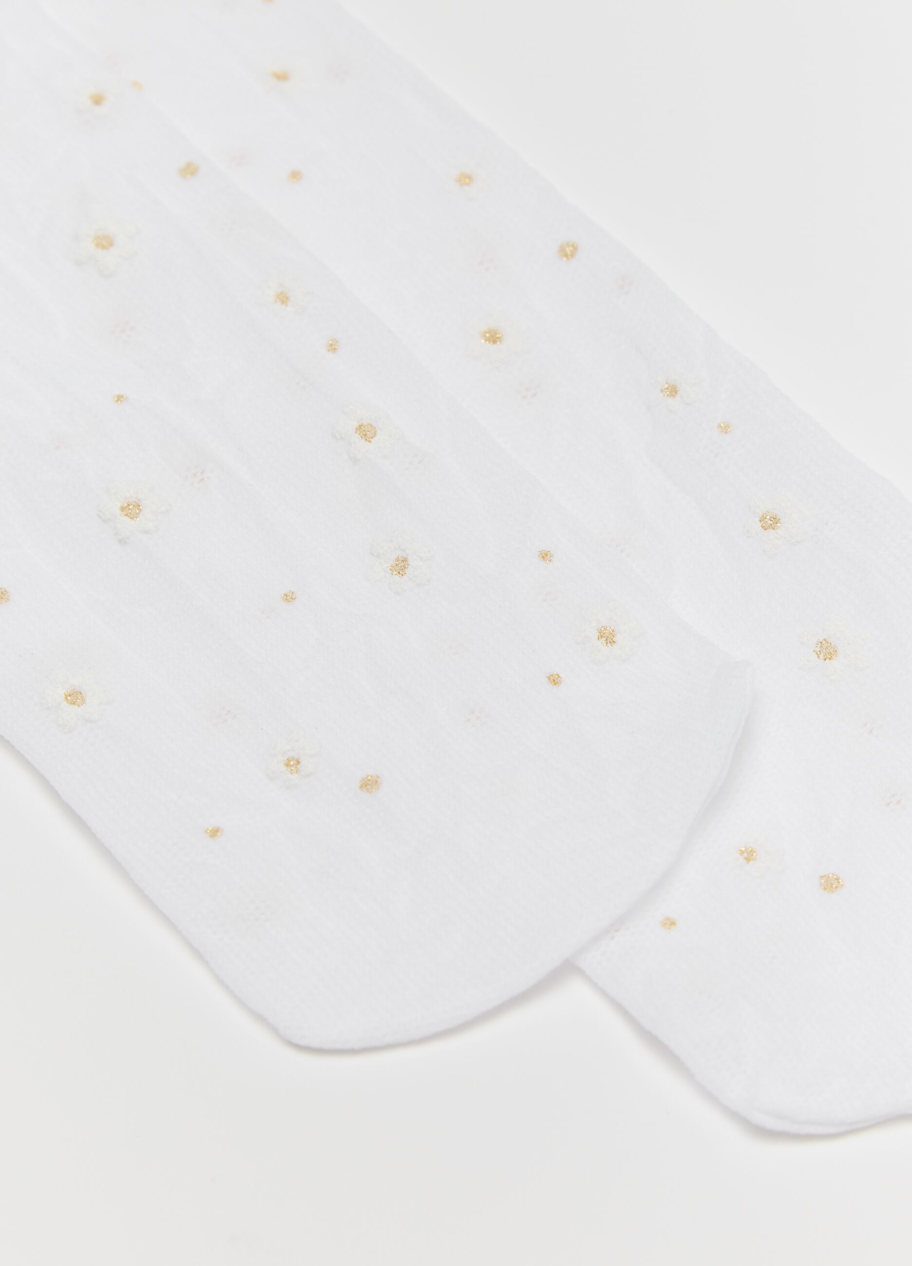 White tights with glitter flowers