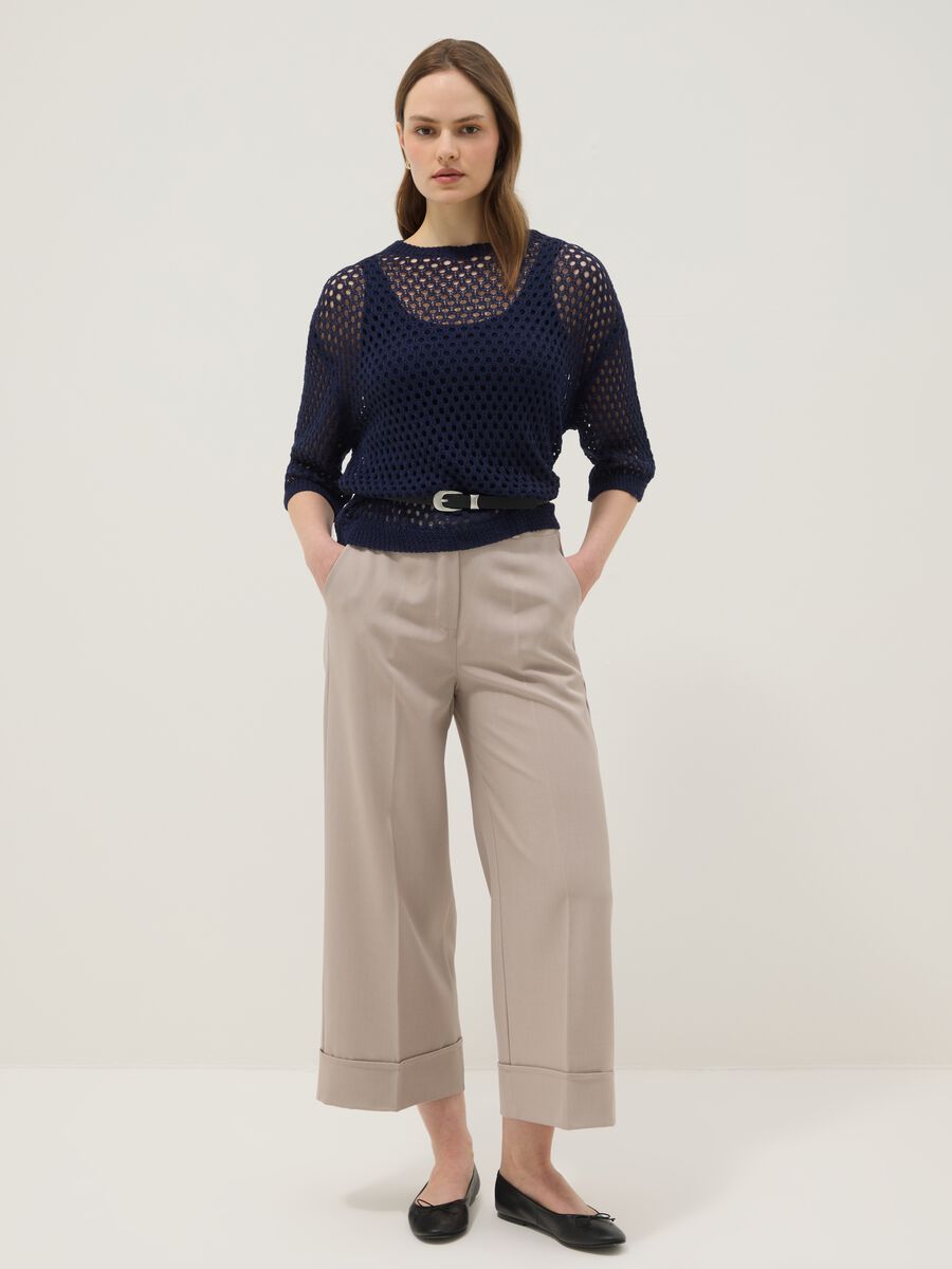 Beige stretch trousers with turn-up hem_0