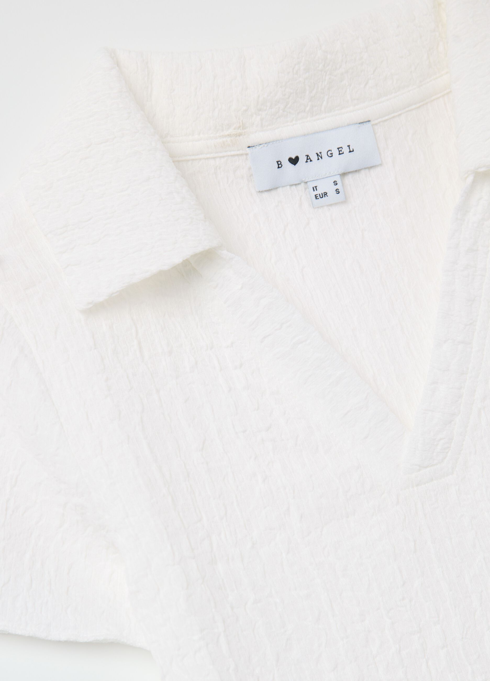 White crinkle-effect crop polo shirt