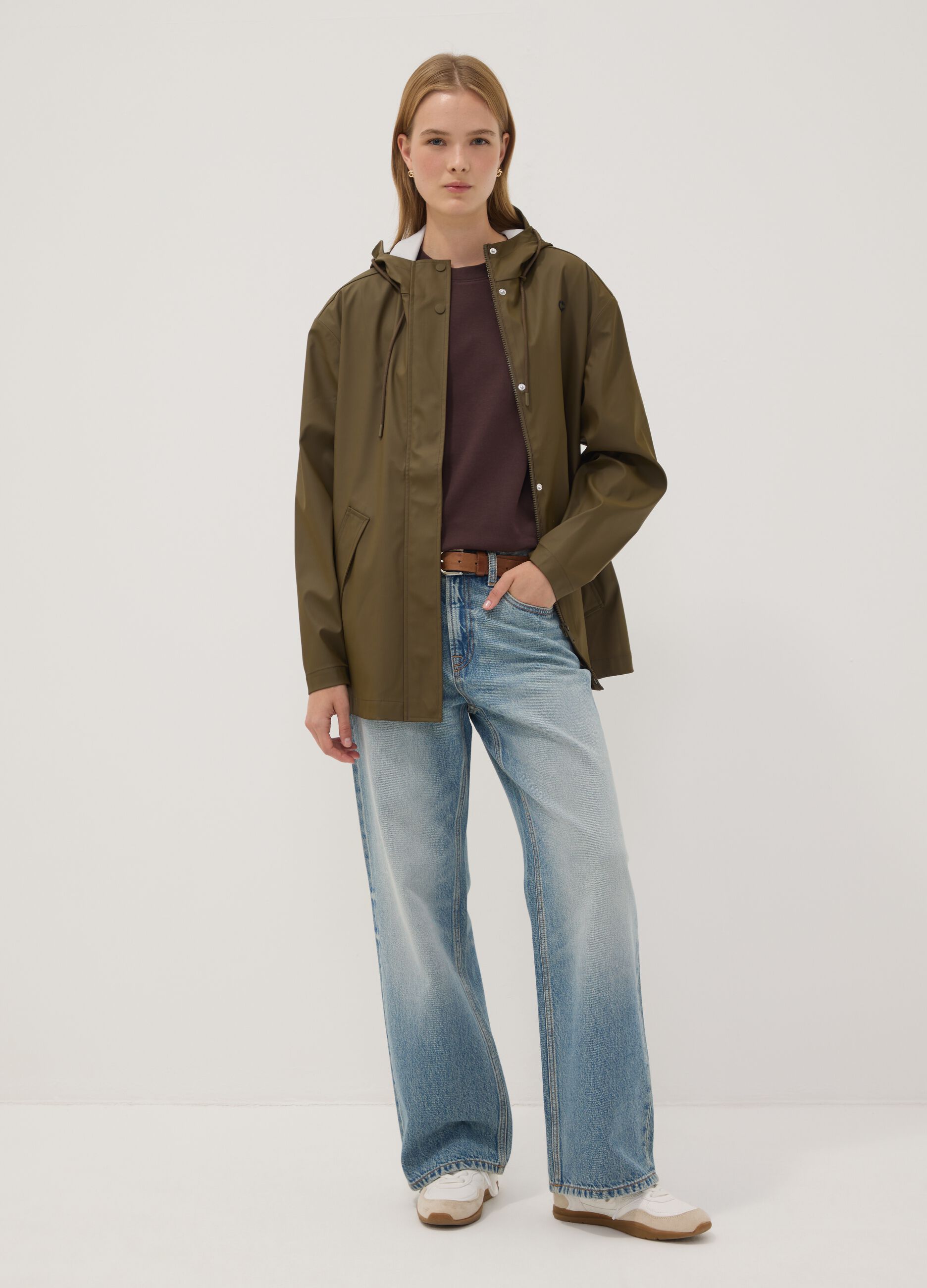 Green rain jacket with zip and hood