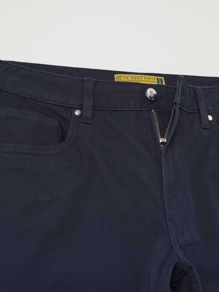 Trousers with five pockets and couture stitched weave_5