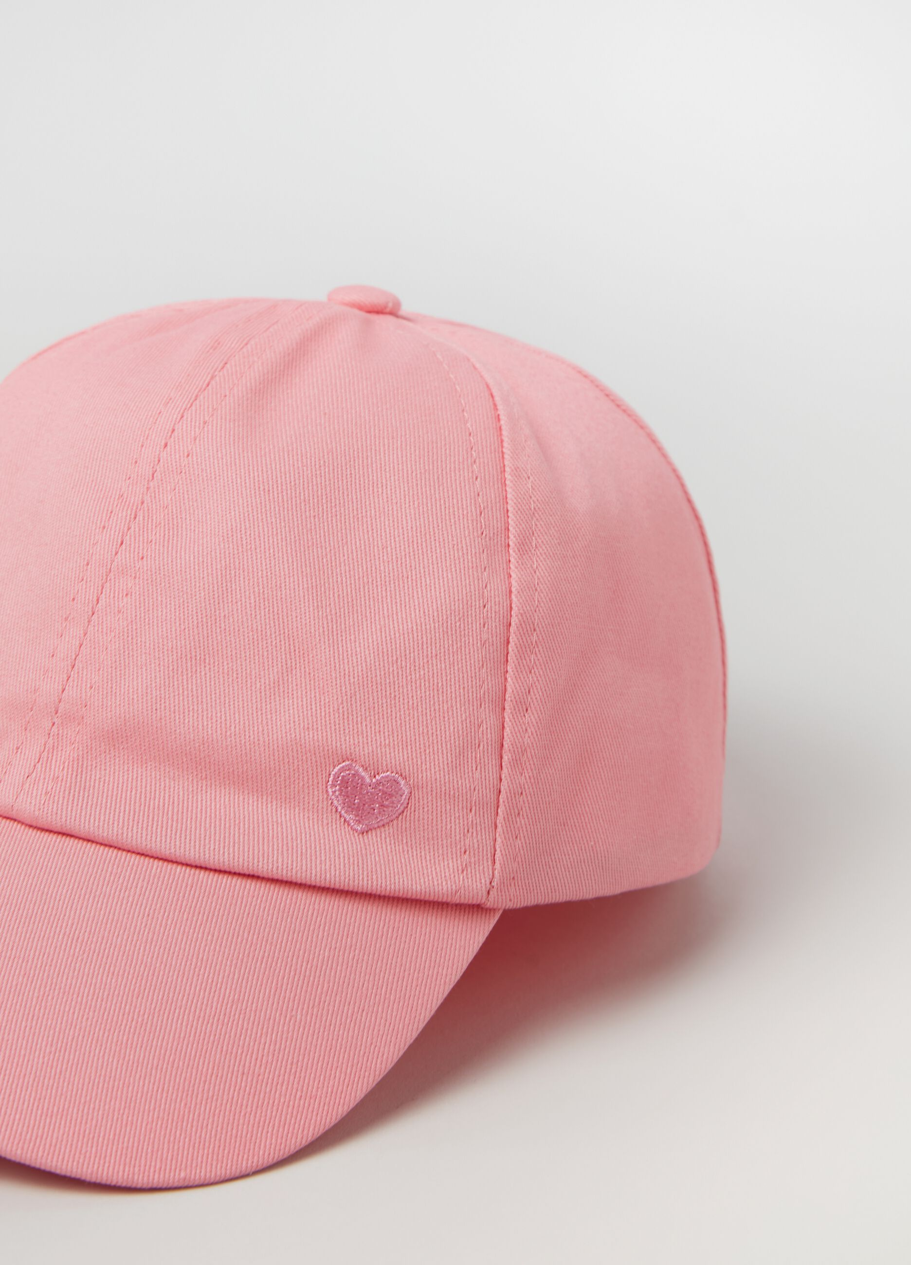 Baseball cap with small heart embroidery