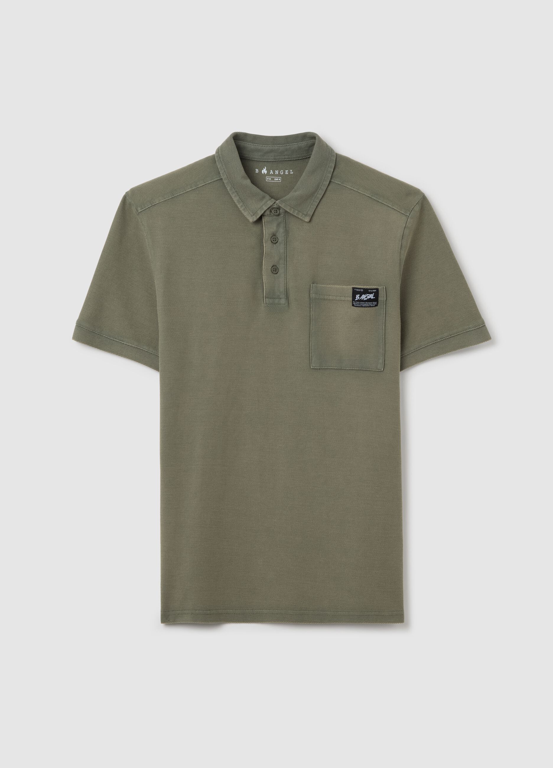 Green short-sleeved polo shirt in cotton piquet