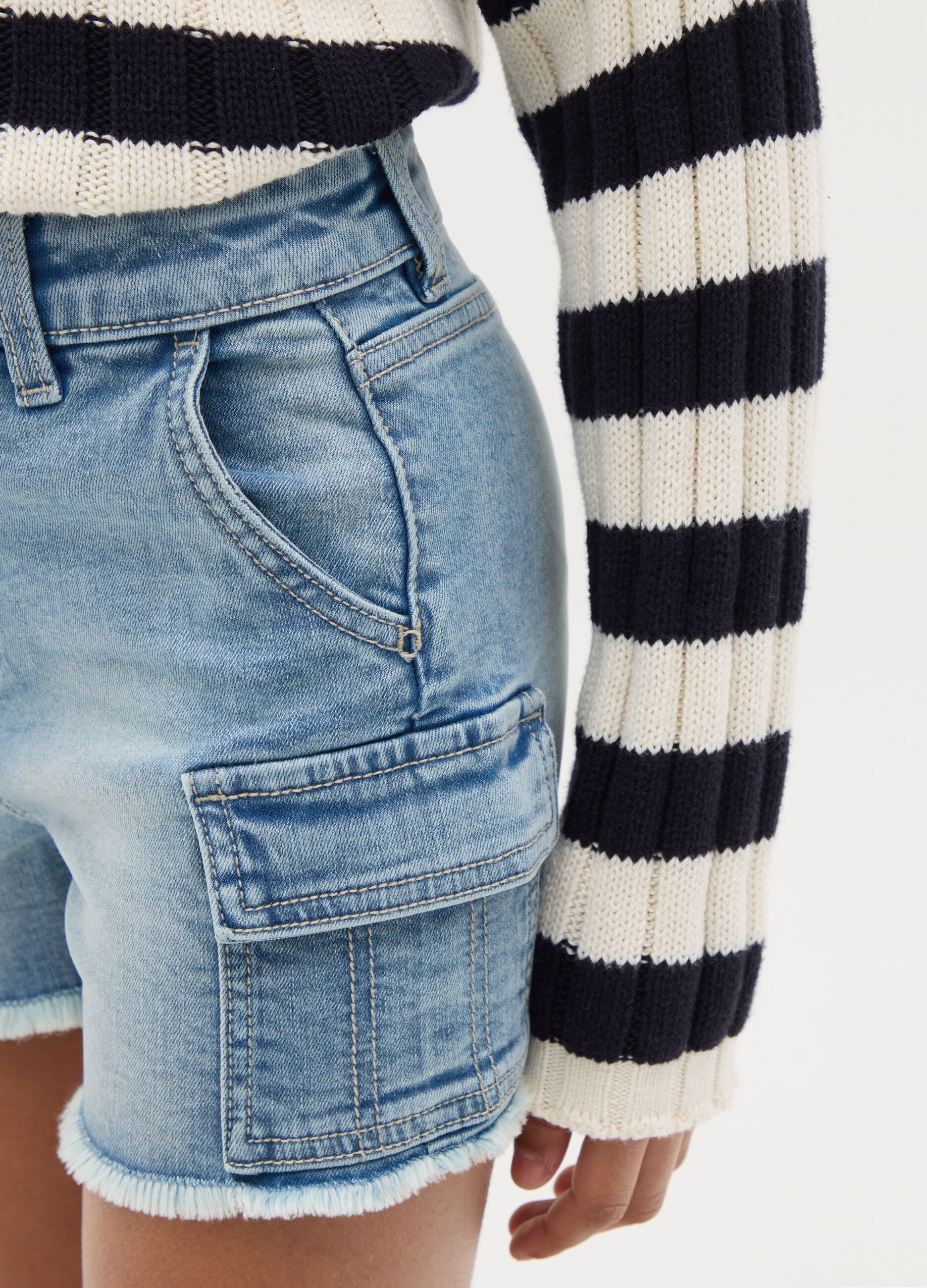 Denim cargo shorts with fringed hem