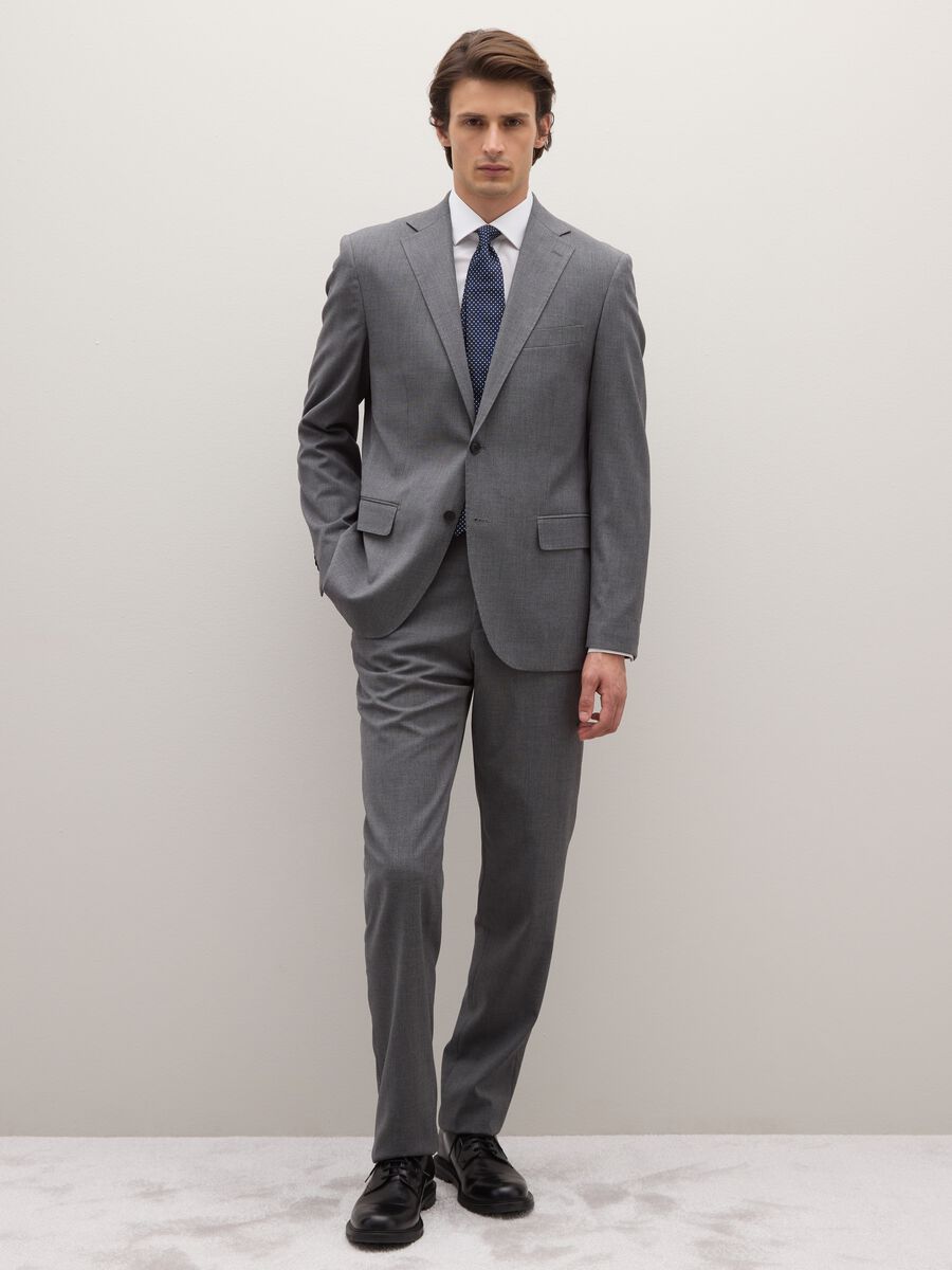 Pure silk blue tie with polka dot pattern_0