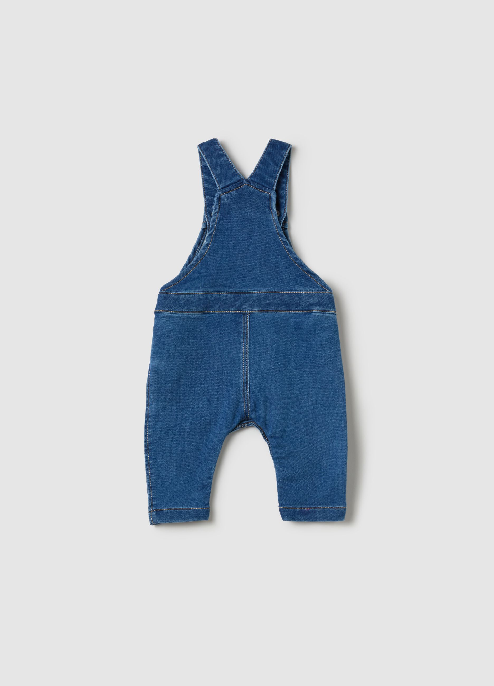 Denim dungarees with pocket