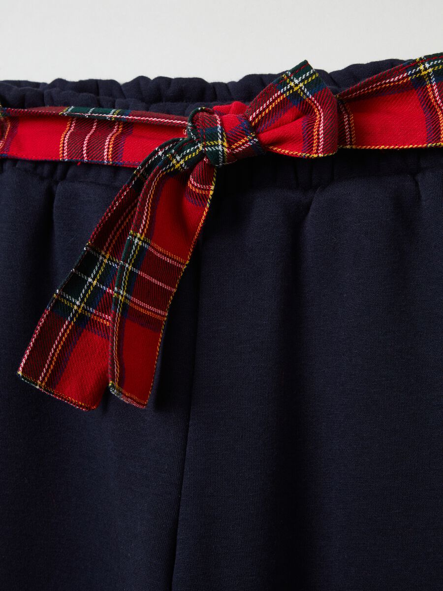 Pantaloni wide leg con fiocco tartan _2
