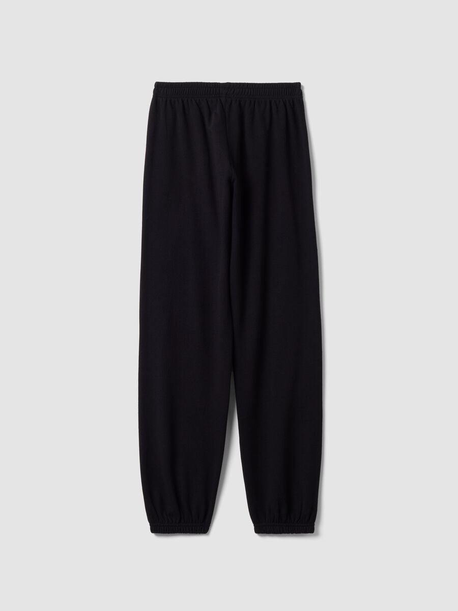 Black organic cotton-blend jogger trousers with printed detail for girls_1