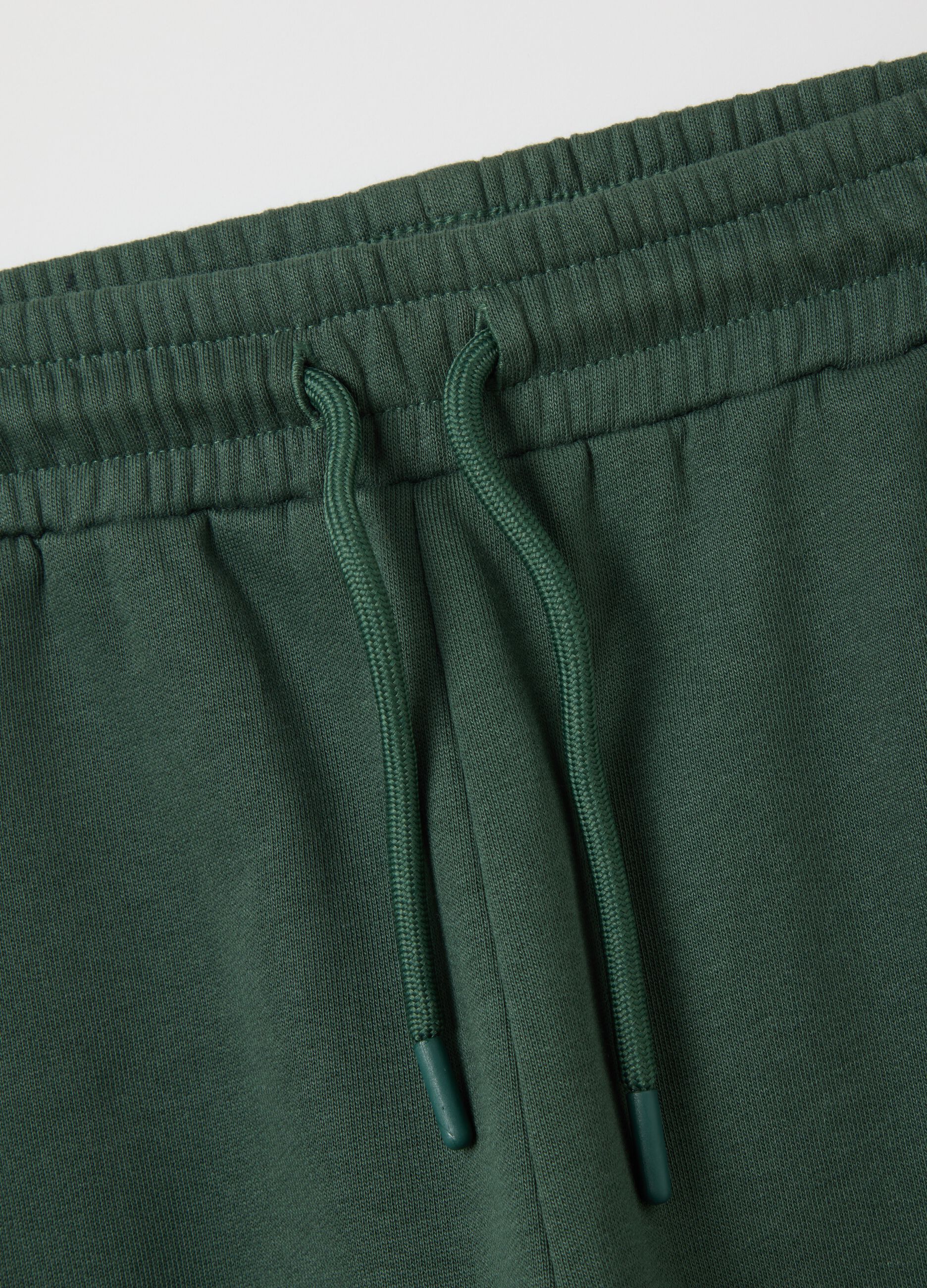 Children's green jogger trousers in pure cotton