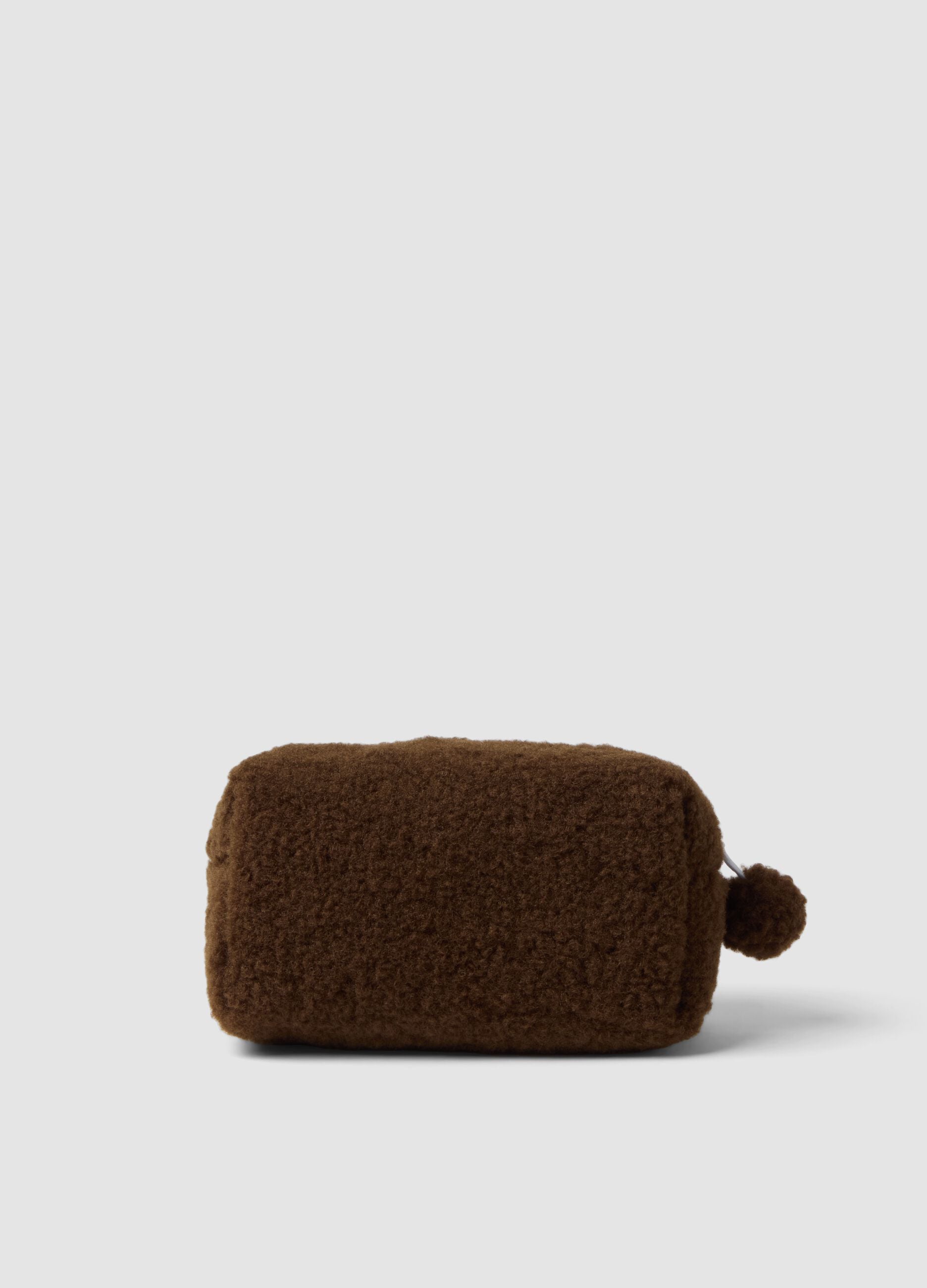 Brown beauty case with pompom